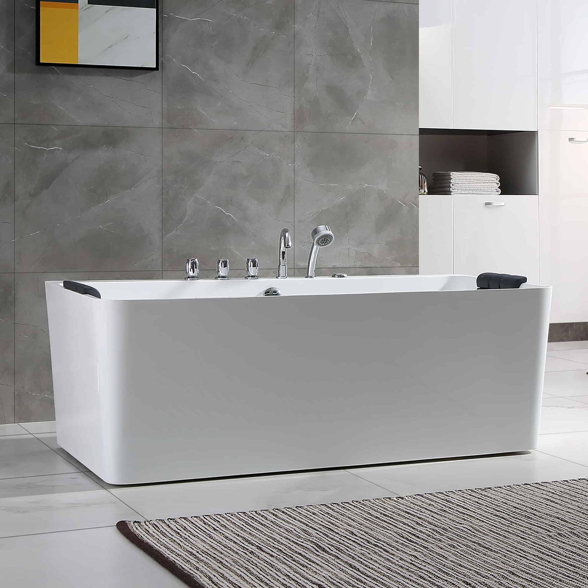 White freestanding acrylic whirlpool bathtub with chrome faucet and removable cover pads