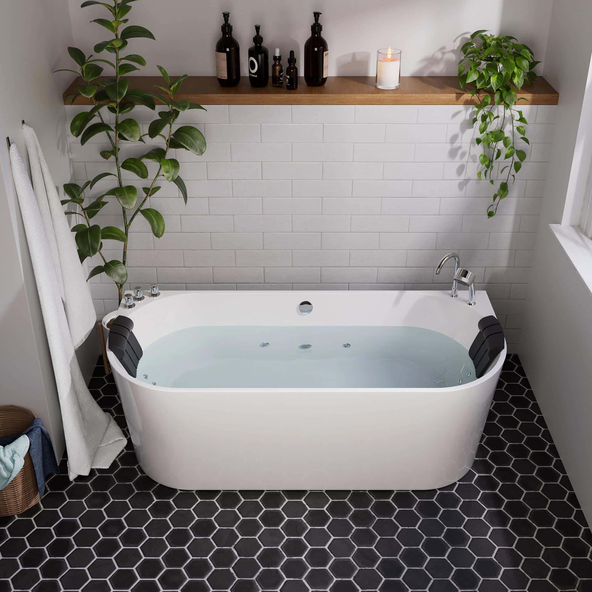 White freestanding acrylic whirlpool bathtub with chrome faucet and black headrests