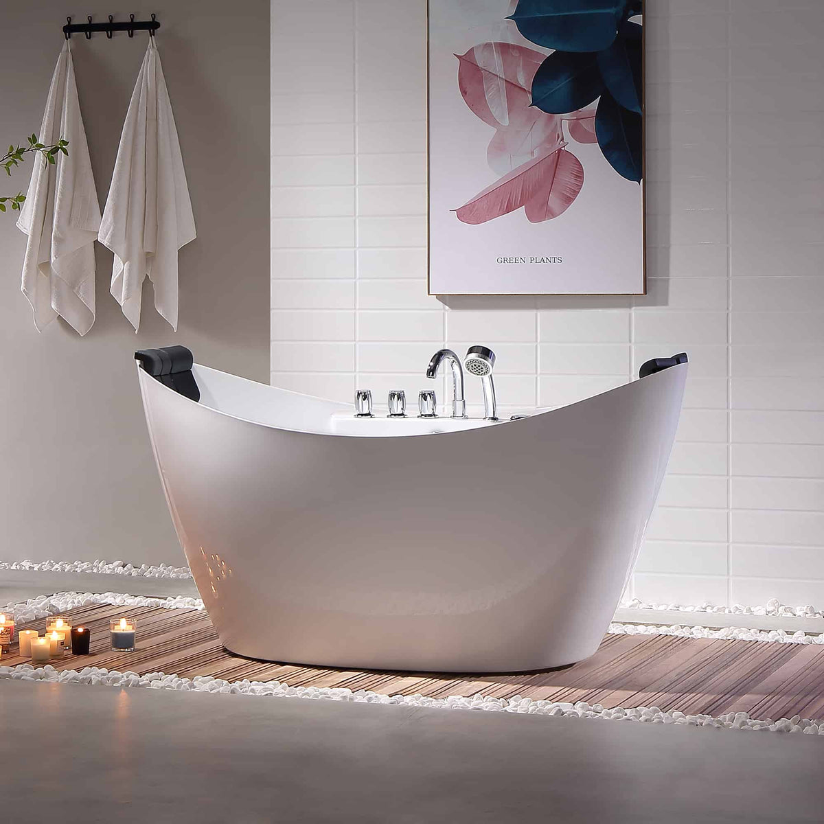 White freestanding acrylic bathtub with chrome faucet, black headrests, and whirlpool jets.