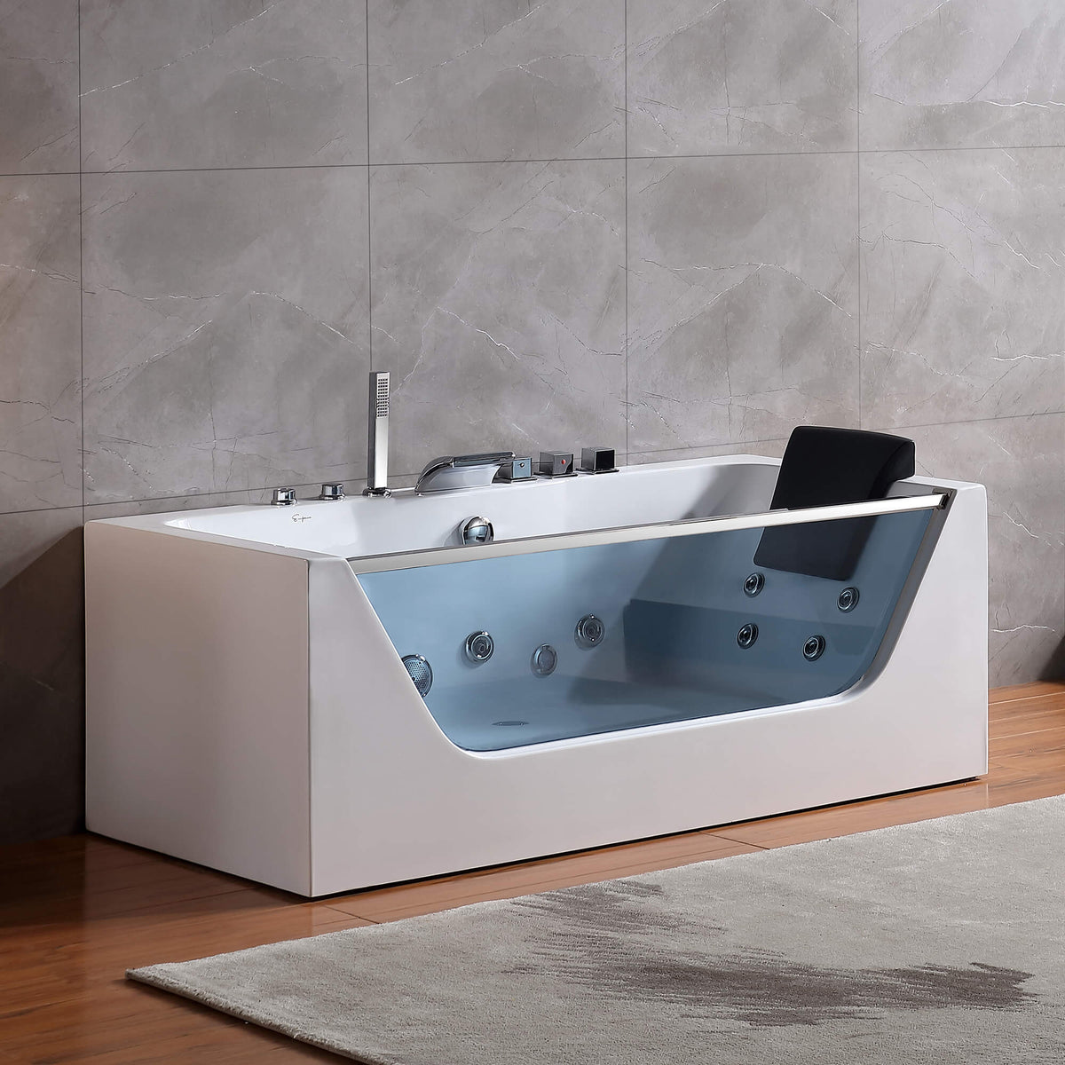 White rectangular whirlpool bathtub with chrome faucet and side jet nozzles