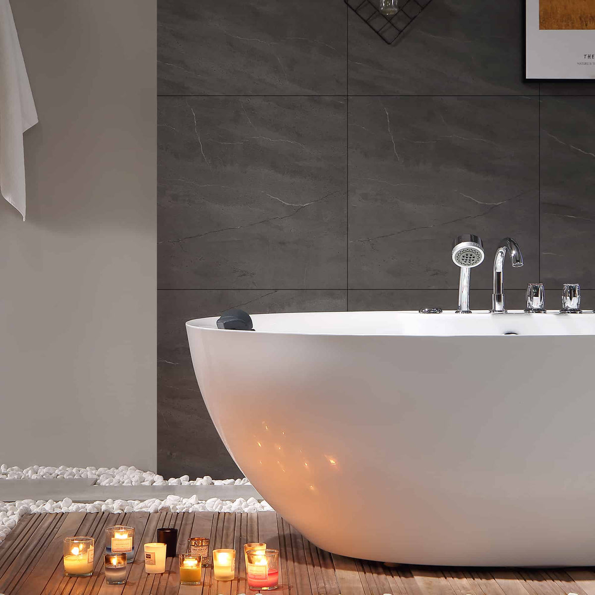 White freestanding acrylic whirlpool bathtub corner view with chrome faucet and jets