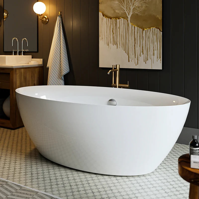 White freestanding soaking tub with center drain and rounded oval shape