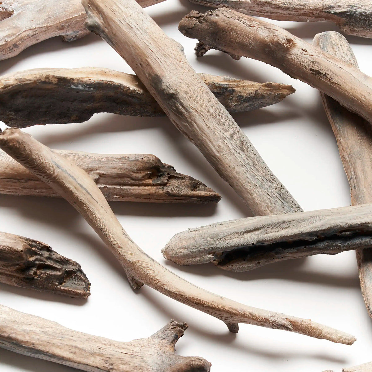 Set of natural-looking wooden logs for an electric fireplace