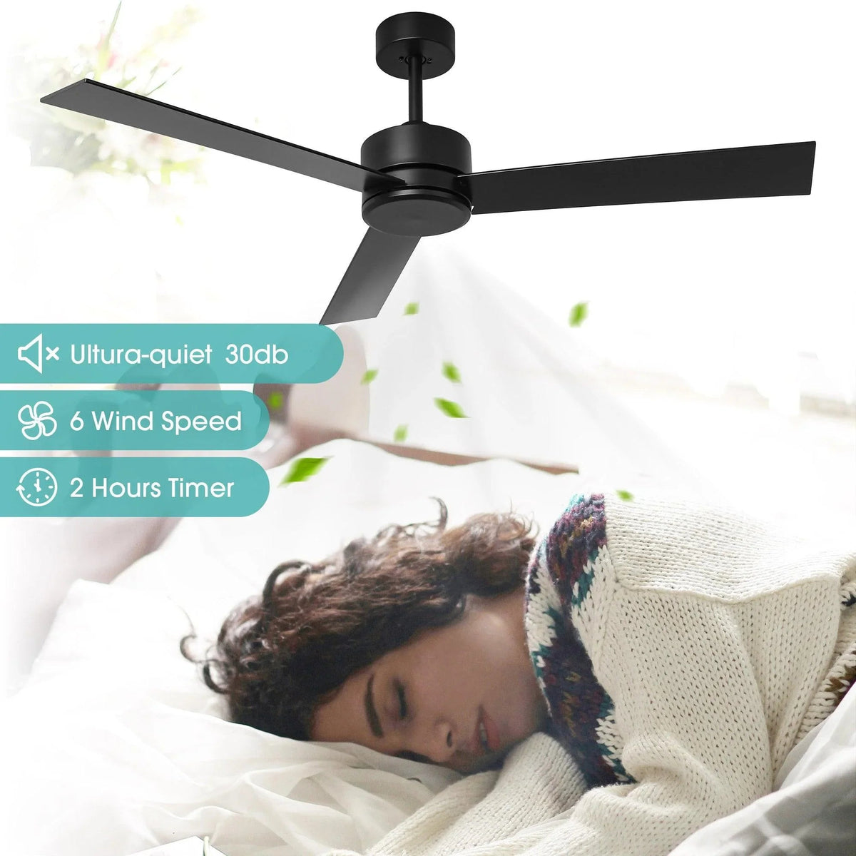 Black 3-blade ceiling fan with downrod mount over a bed