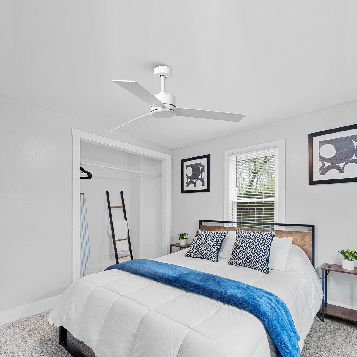 White 3-blade ceiling fan in a bedroom with flush-mounted motor housing