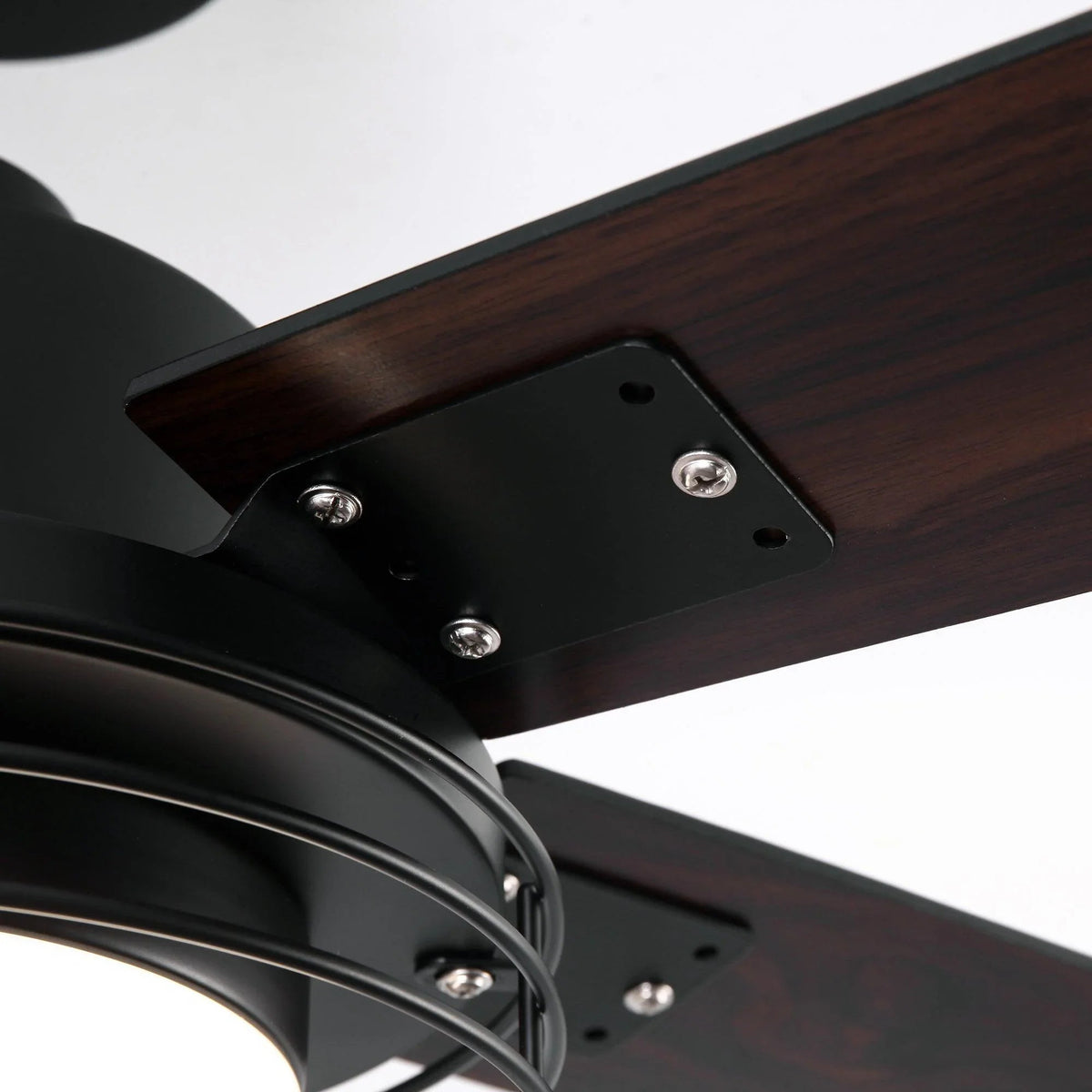 Close-up of Parrot Uncle ceiling fan blade mounting on black housing