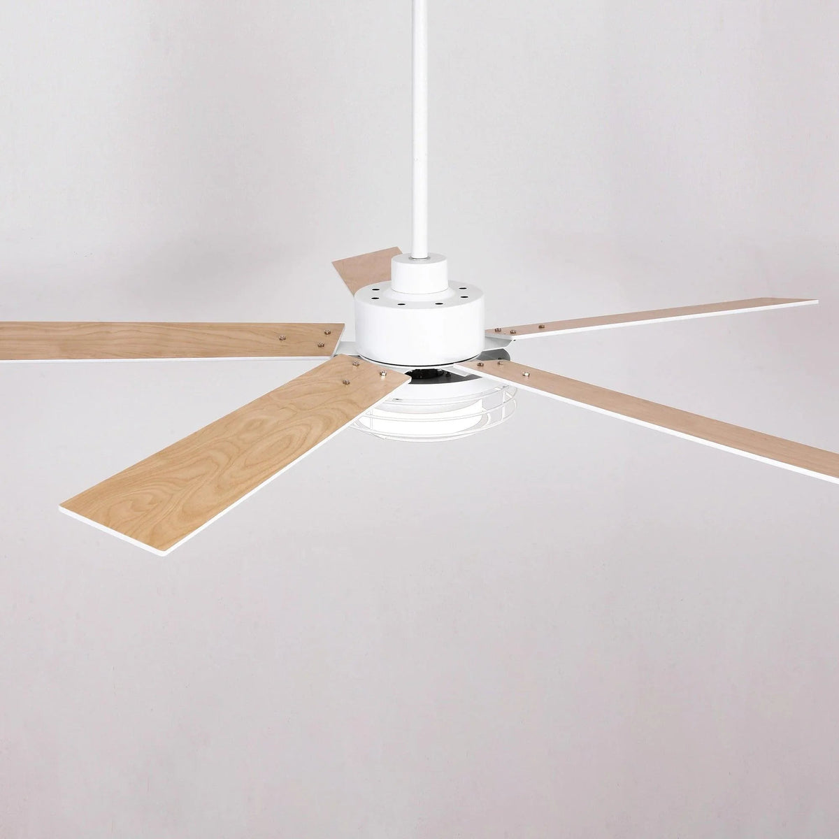 Ceiling fan with white motor housing and four light wood blades