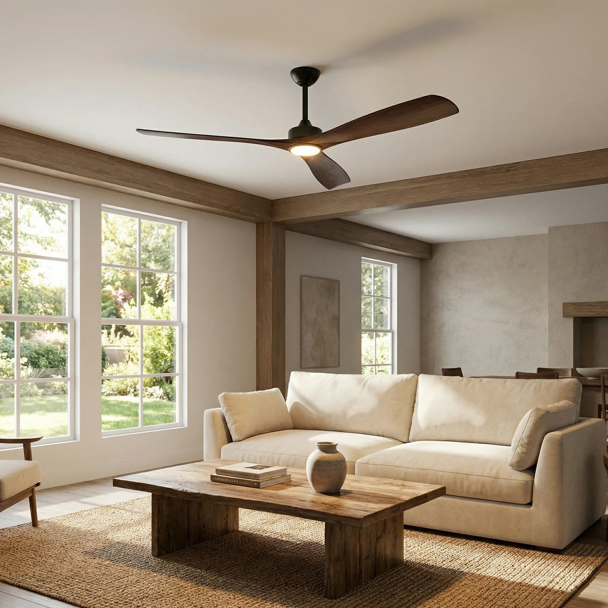 Ceiling fan with LED light, black housing and dark wood-style blades in a living room