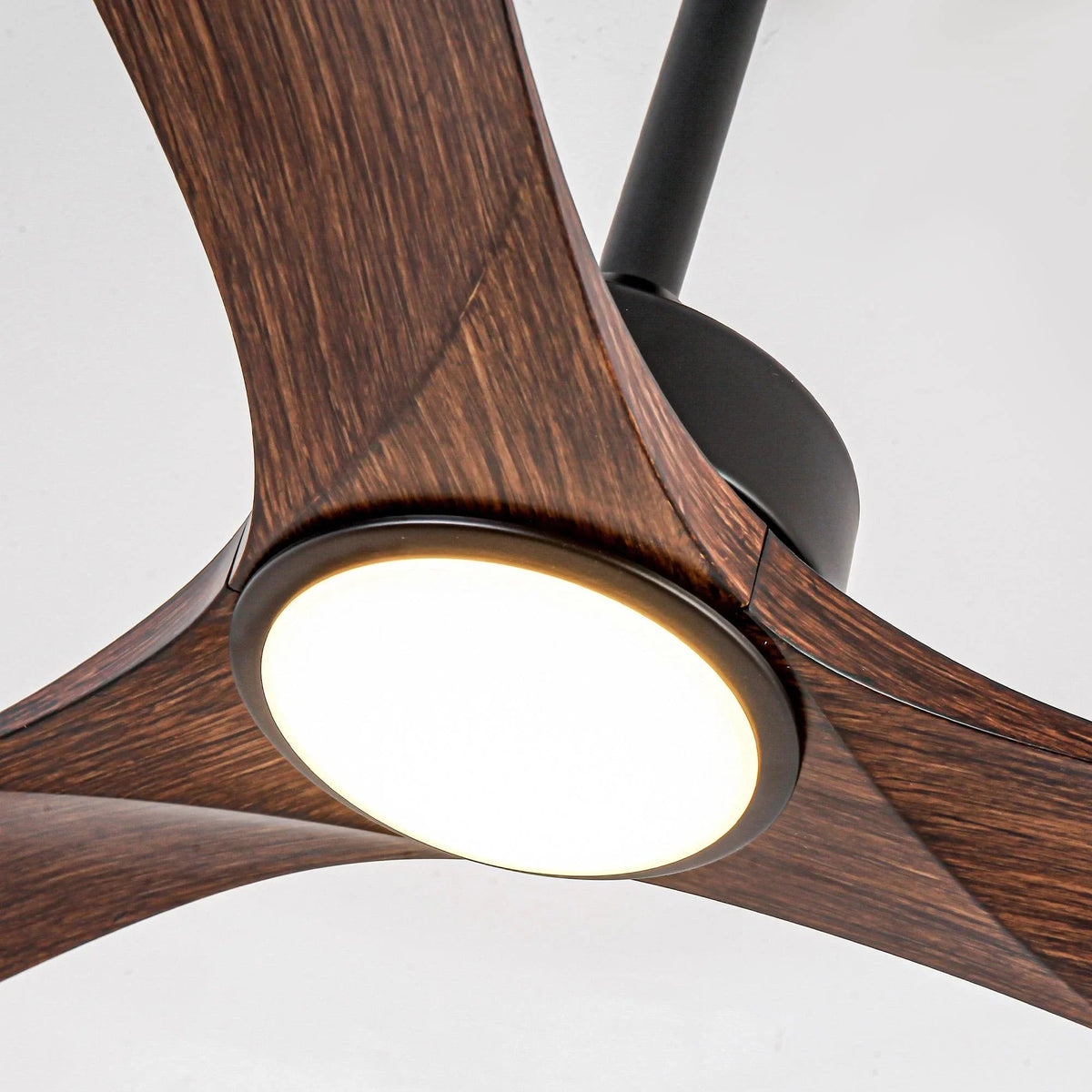 Wood ceiling fan blades with black motor housing and illuminated LED ring