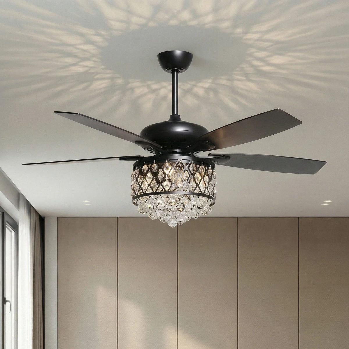 Black ceiling fan with crystal chandelier-style light and 5 blades