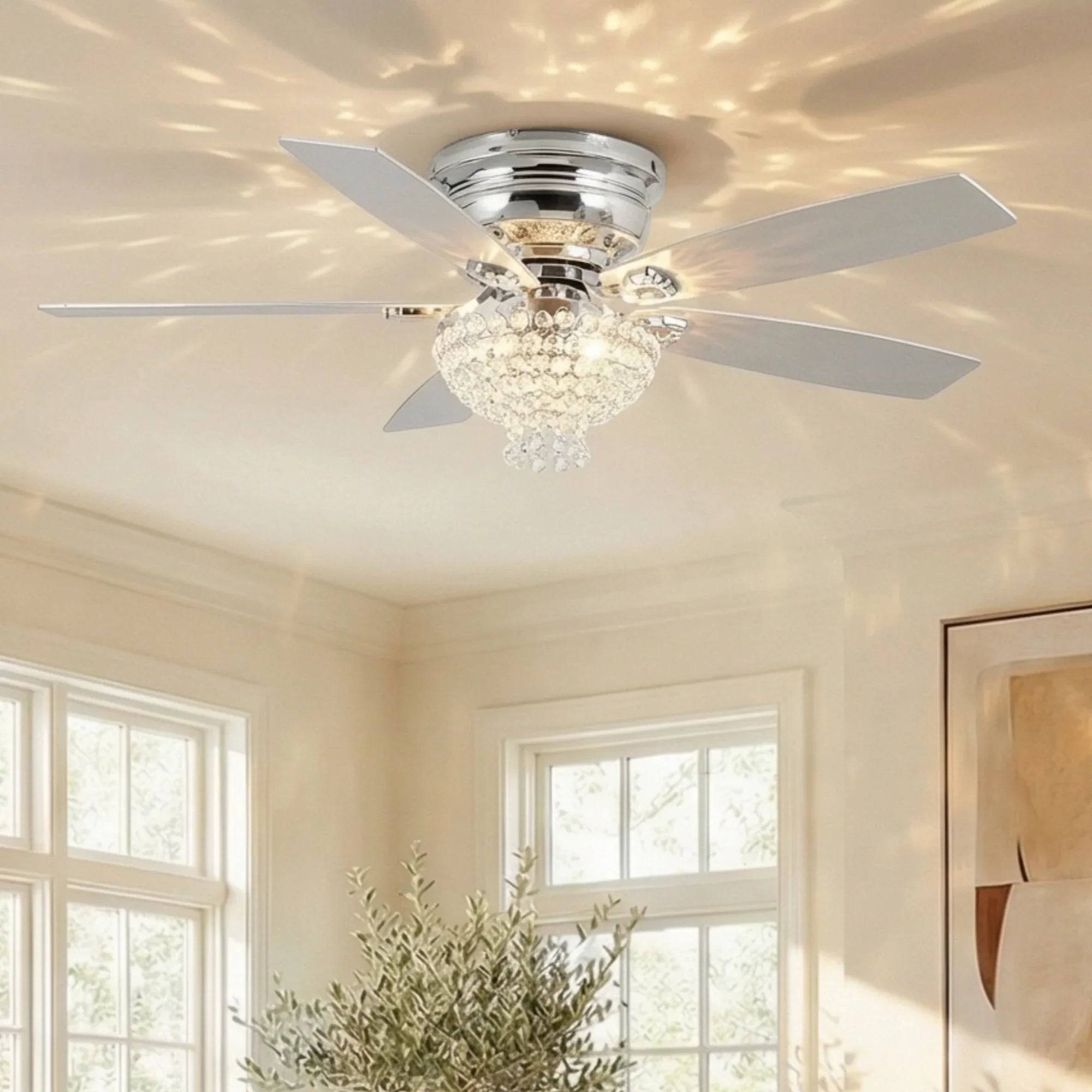 Chrome flush mount ceiling fan with crystal light fixture and four blades