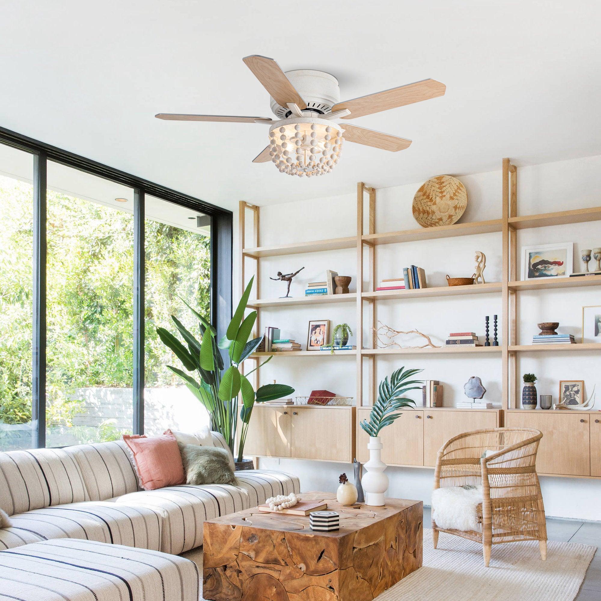 Flush mount ceiling fan with white housing, wood reversible blades, and bead light kit