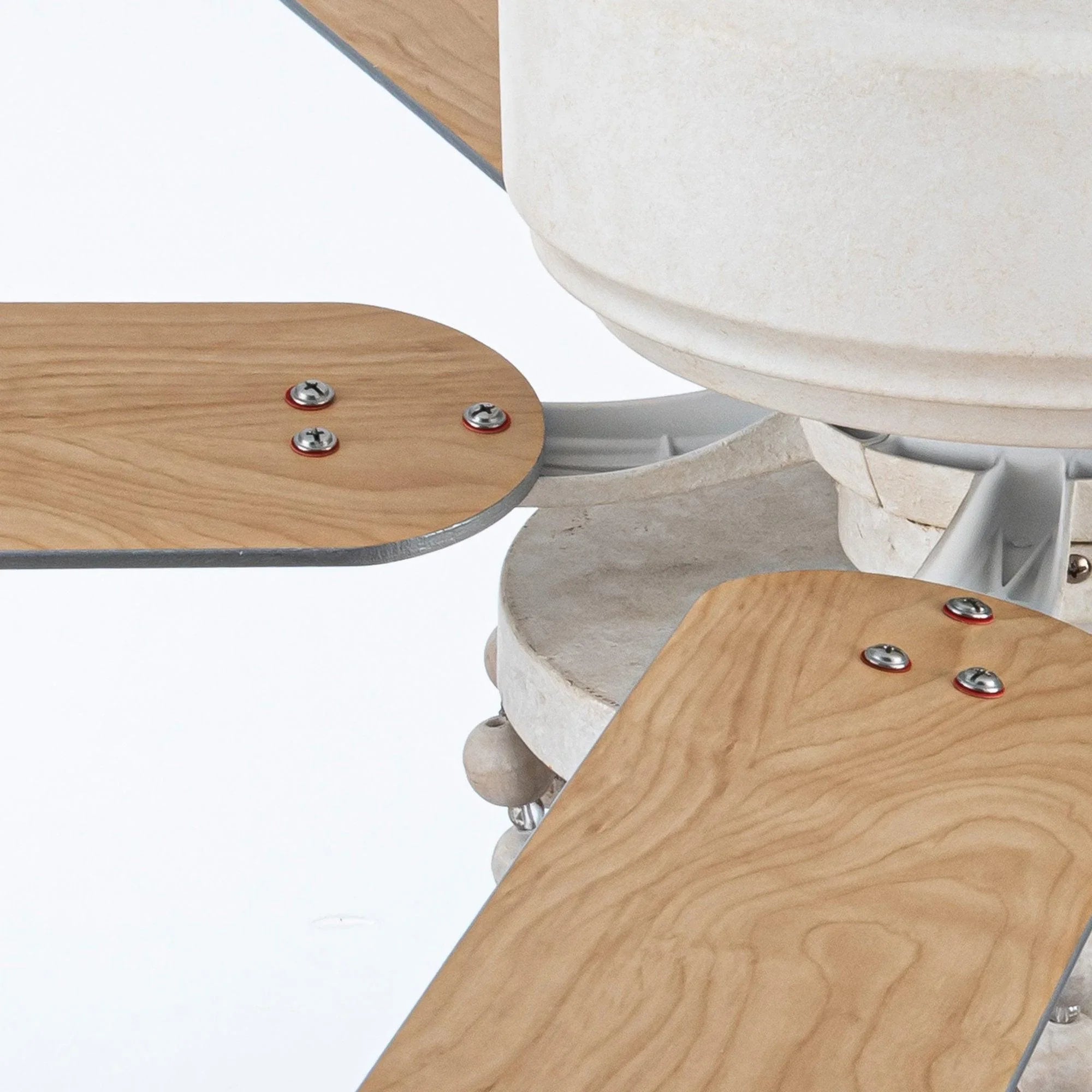 Ceiling fan blade attachment detail with wood blades and silver mounting screws
