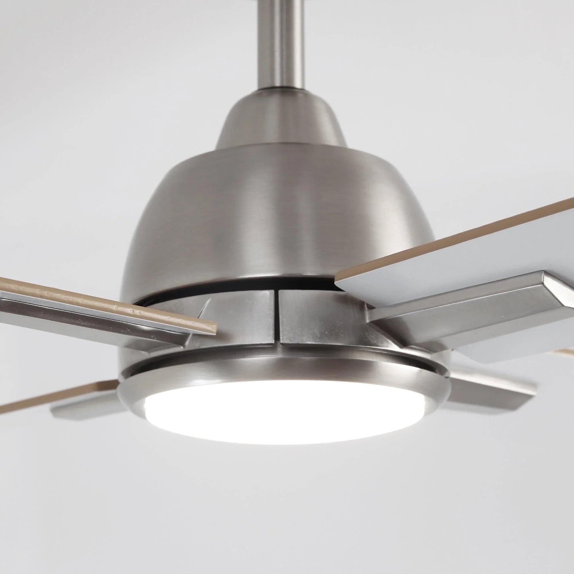 Satin nickel ceiling fan with round LED light and three visible reversible blades