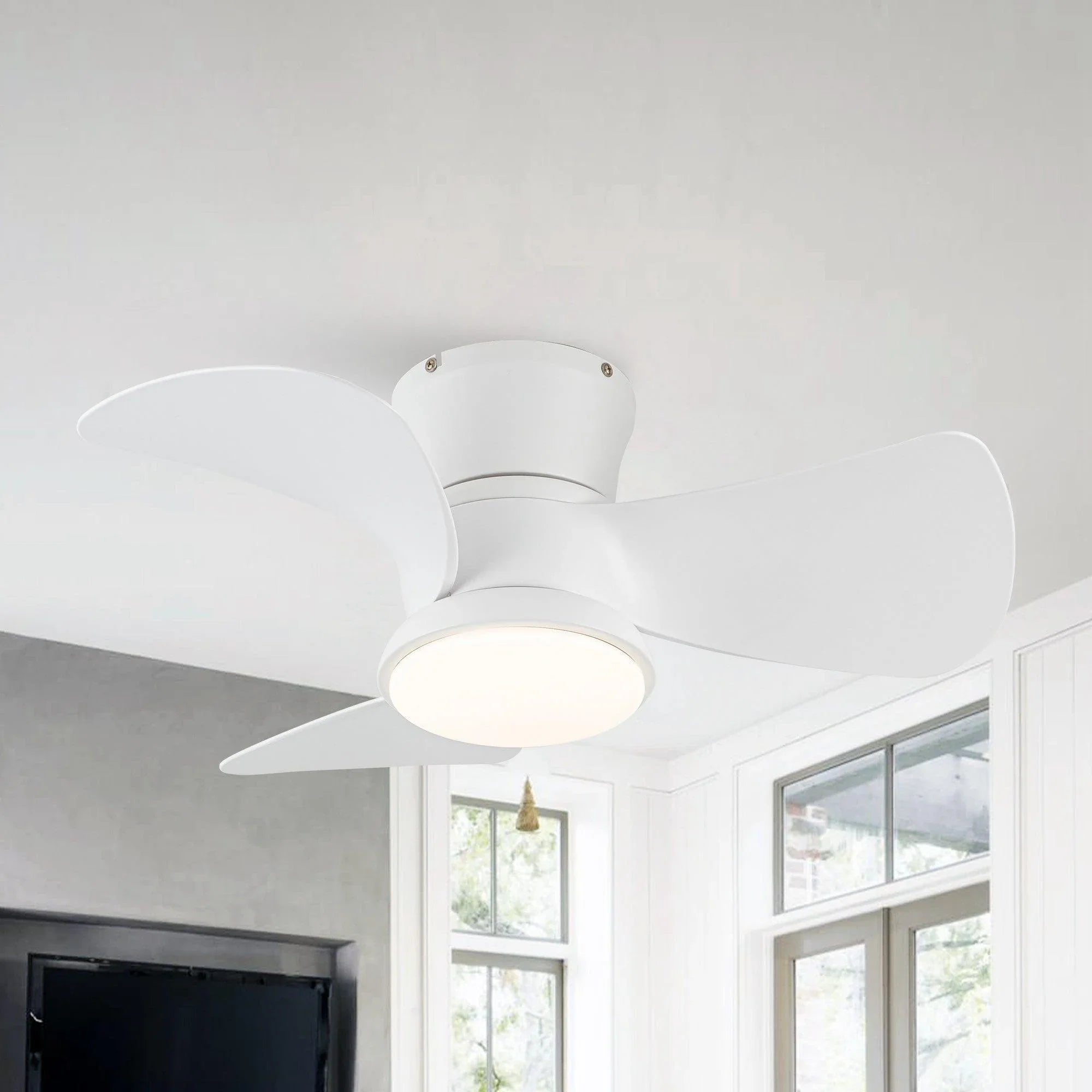 White flush-mount ceiling fan with three blades and round integrated light.