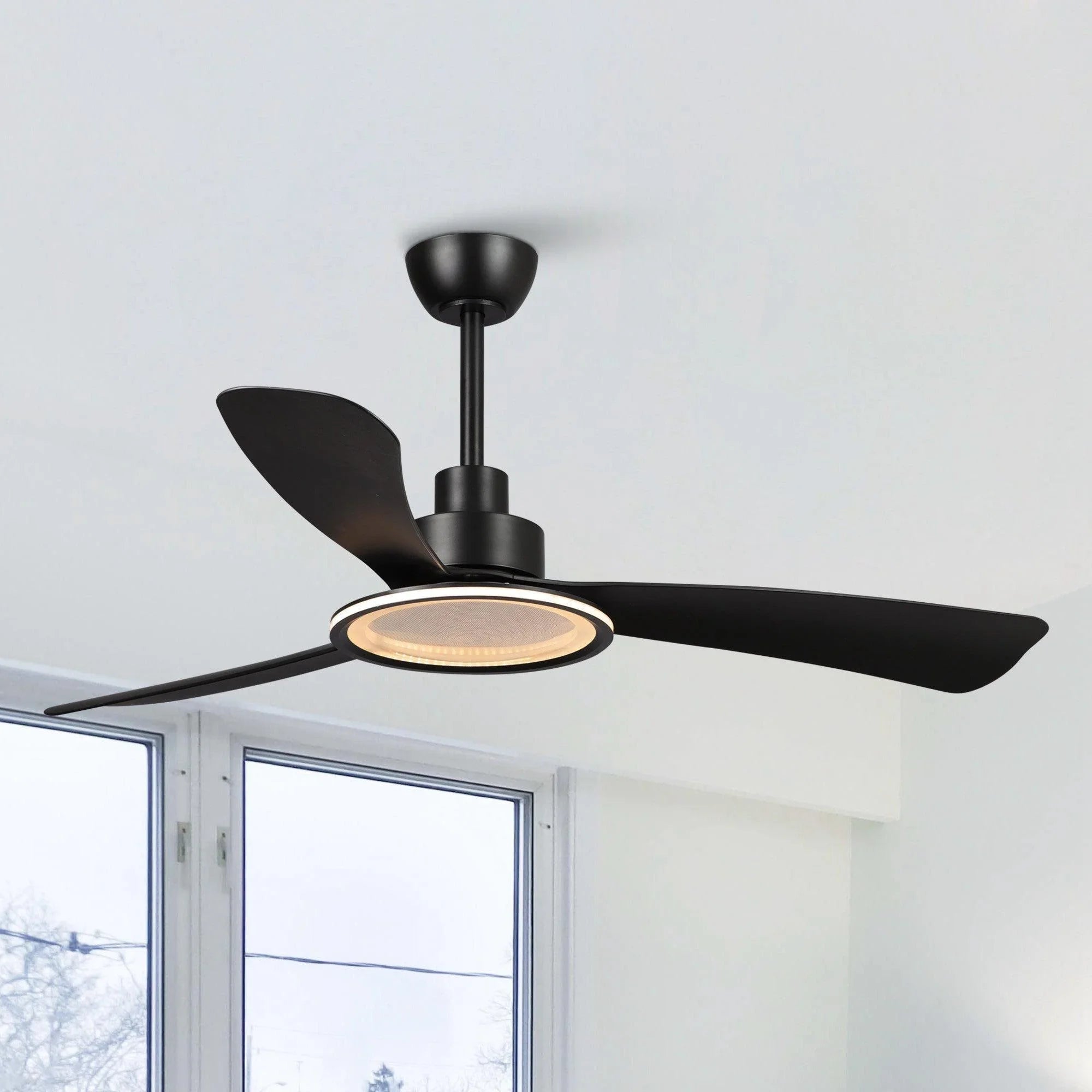Black ceiling fan with warm-lit light disc and three dark blades