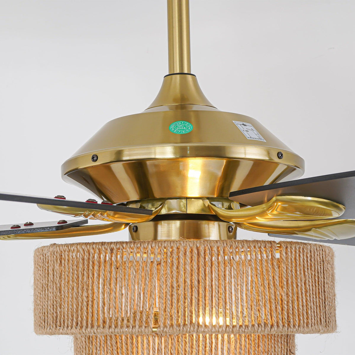 Golden ceiling fan motor and integrated light kit with woven rope shade