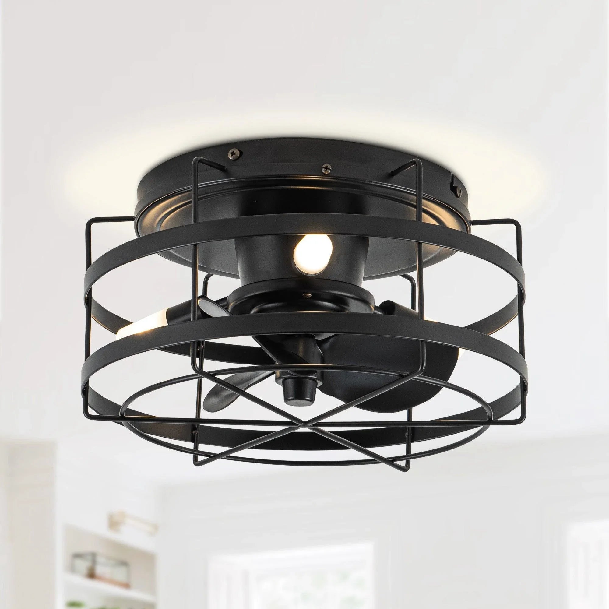 Black ceiling fan flush mount with metal cage and lit central bulb
