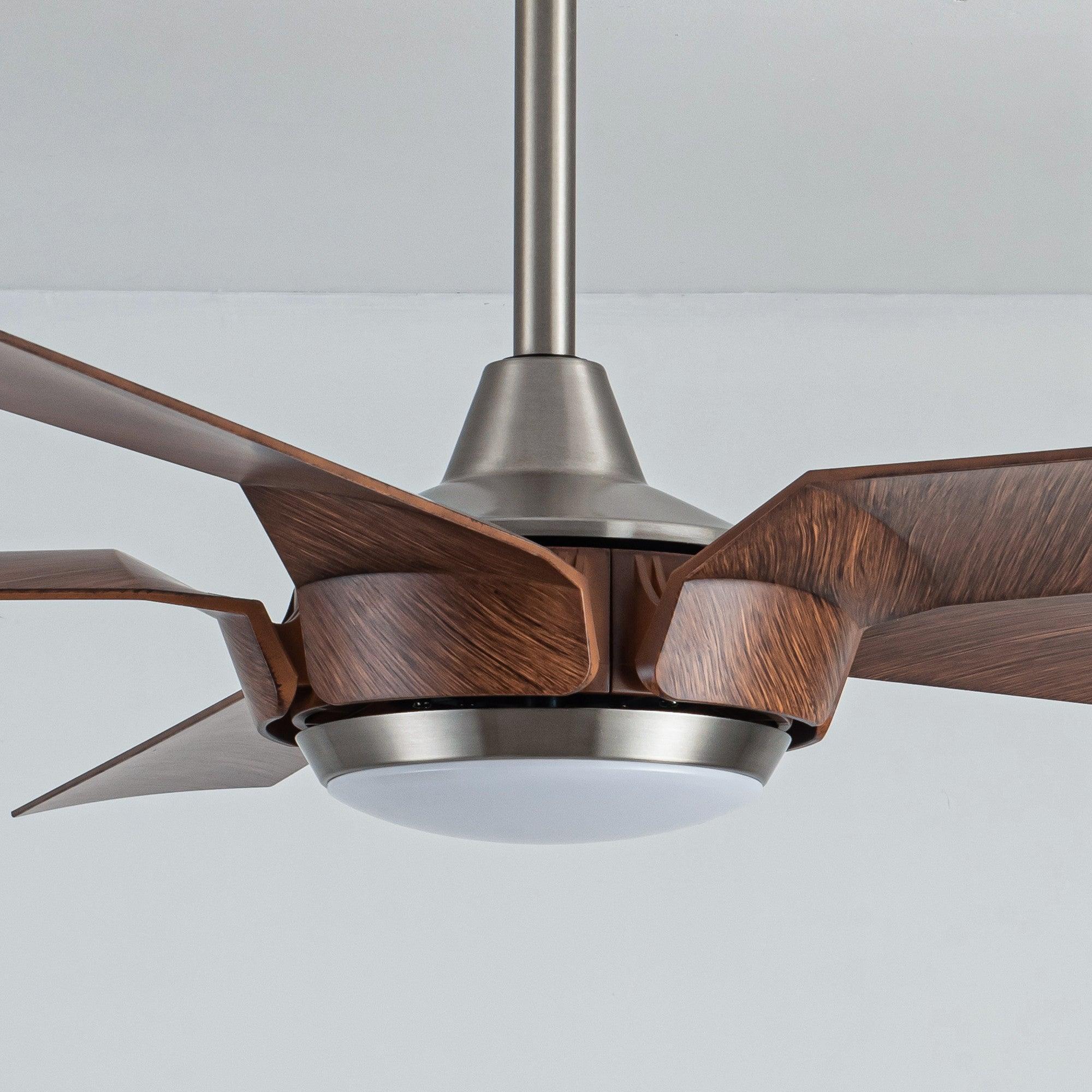 Ceiling fan with brushed nickel canopy, warm wood blades, and circular light diffuser