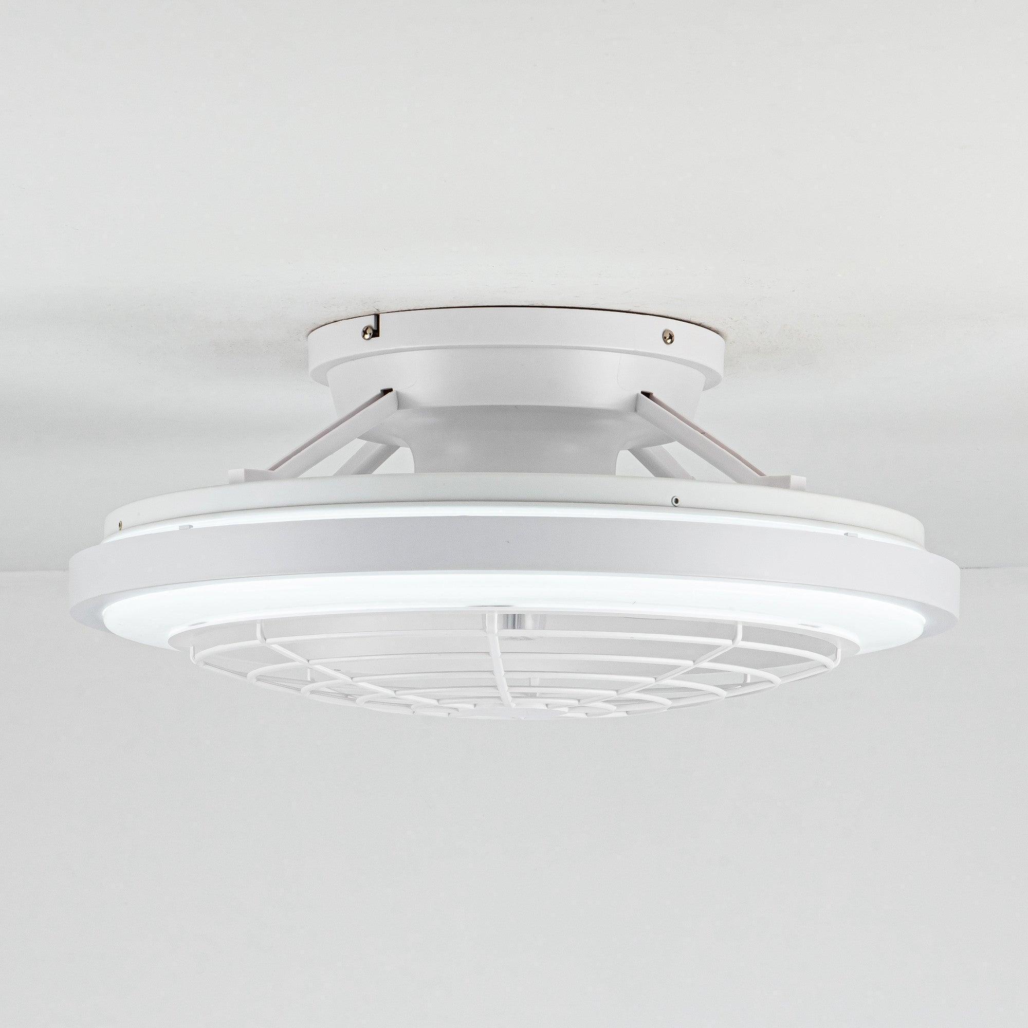 White flush mount ceiling fan with circular fan grille and central light housing.