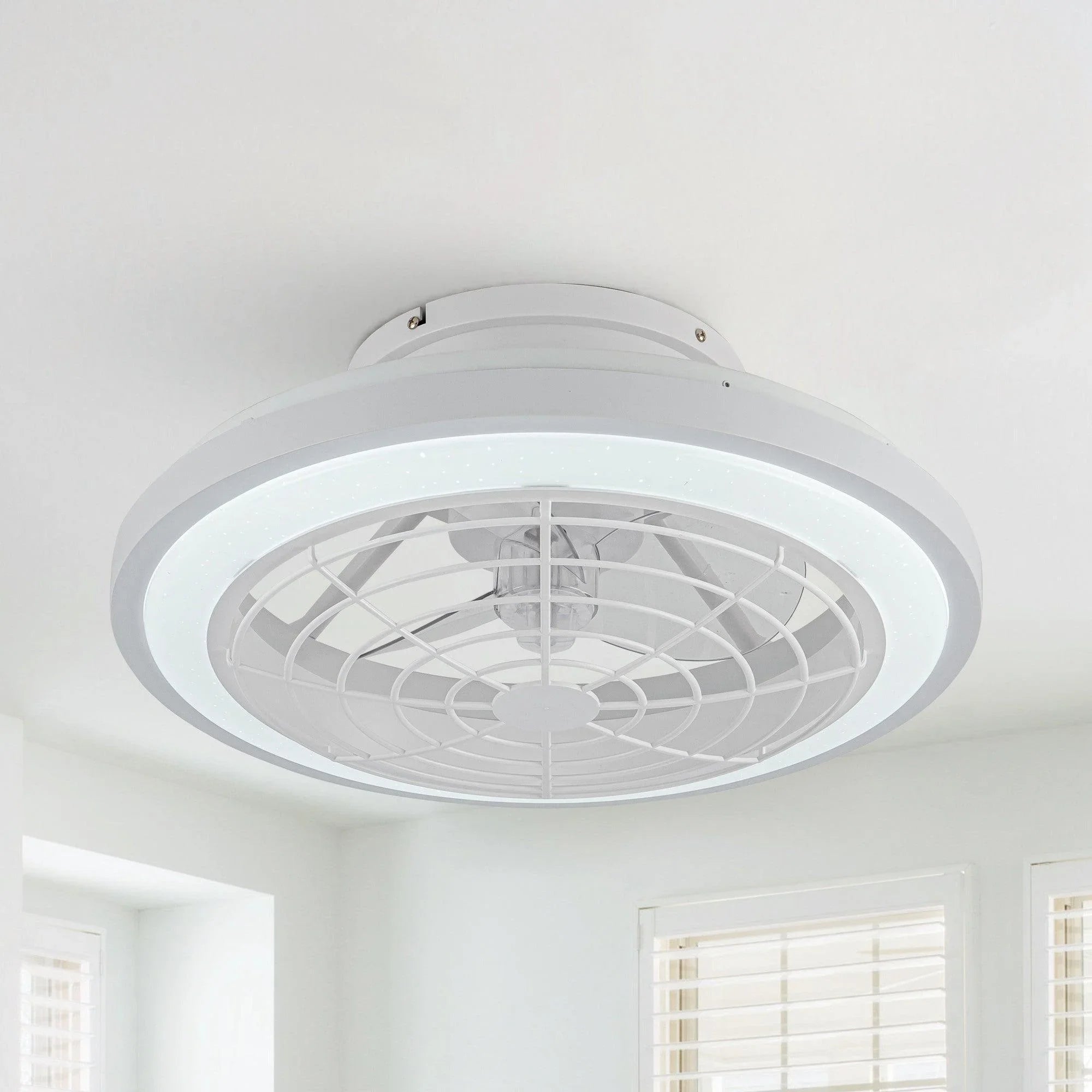 White flush-mount ceiling fan with circular ring housing and integrated light