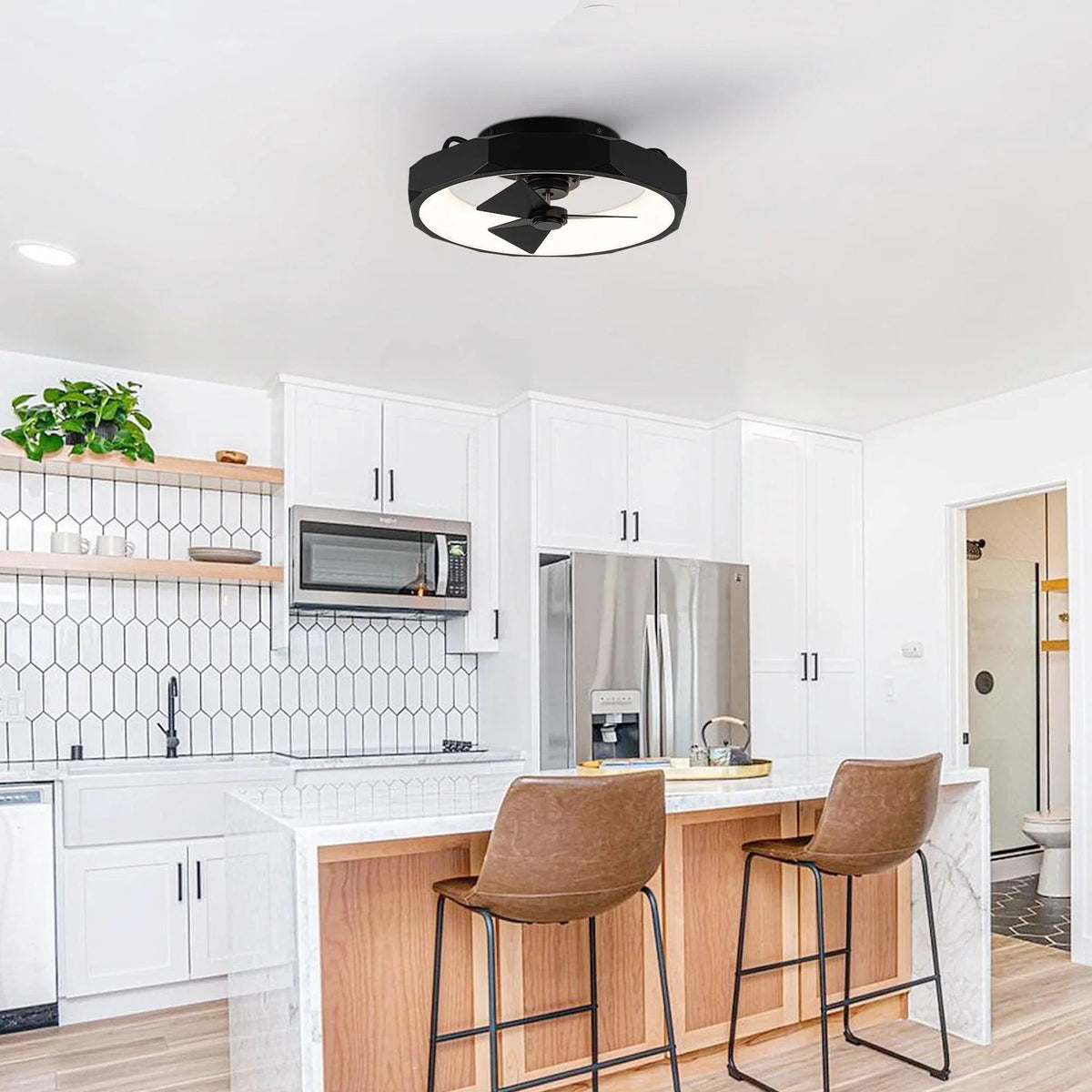 Black flush mount ceiling fan with integrated light and three blades