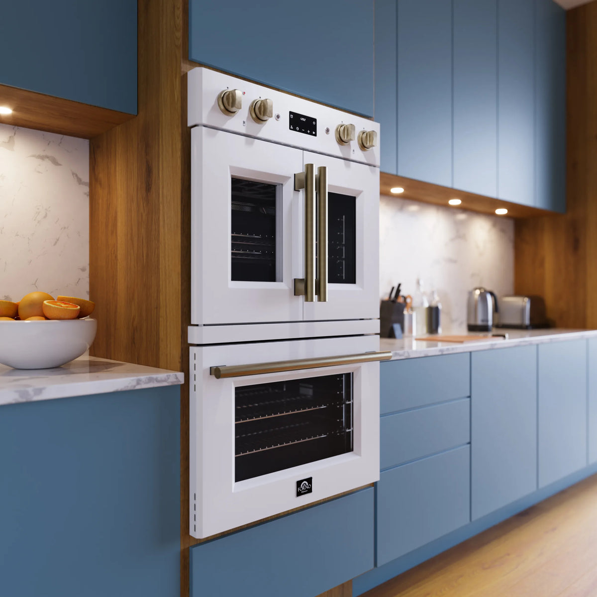 Forno Asti 30-Inch Double 7.36 Cu. Ft. Electric Wall Oven with Upper French Doors in White with Antique Brass Trim shown in a styled kitchen