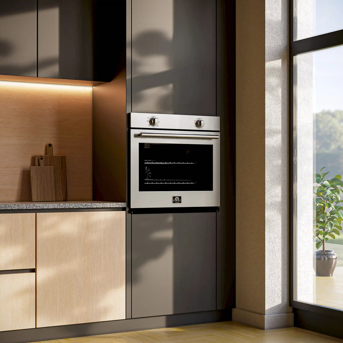 Stainless steel single wall oven built into kitchen cabinetry niche with open door display