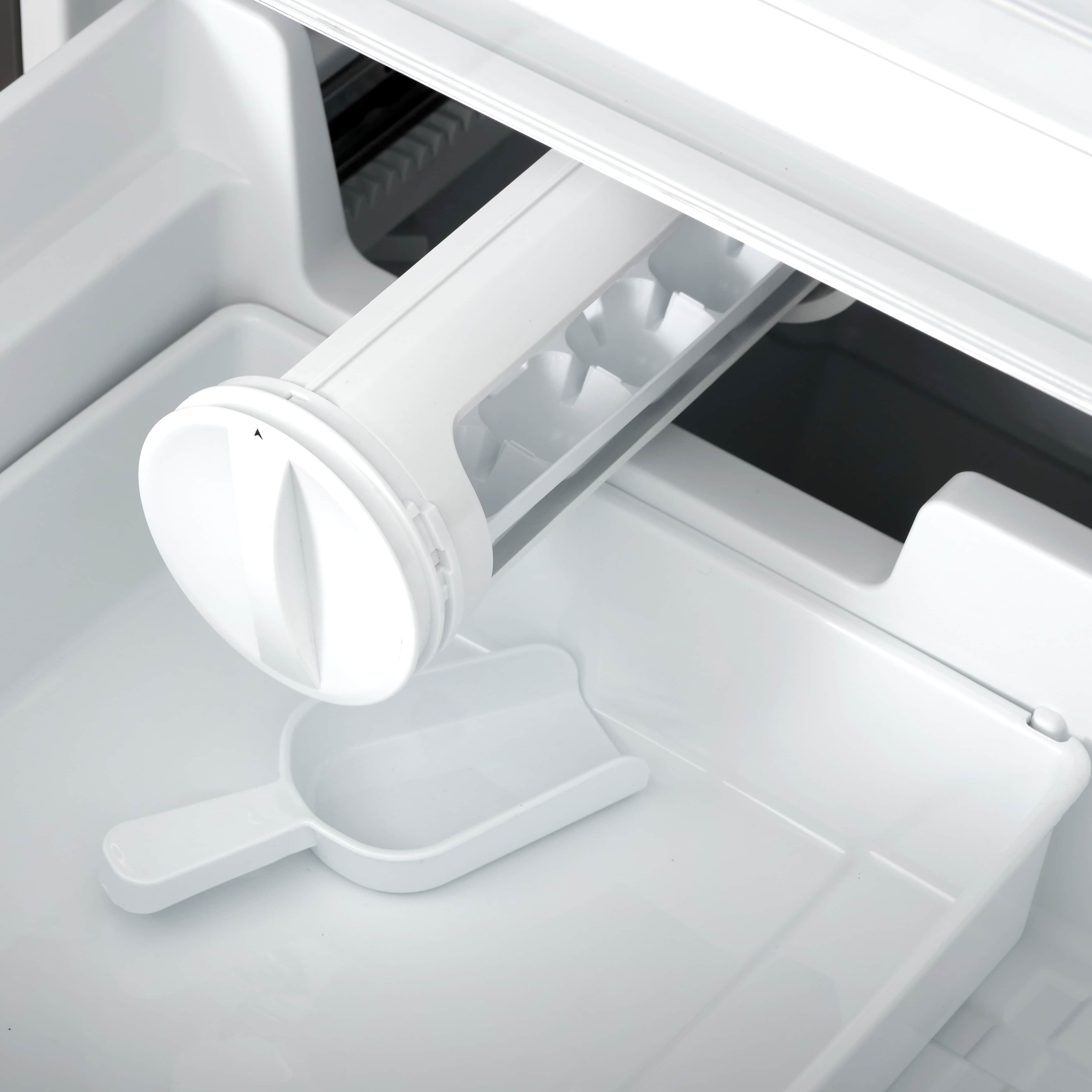 Refrigerator freezer drawer with swing-out ice maker and storage tray
