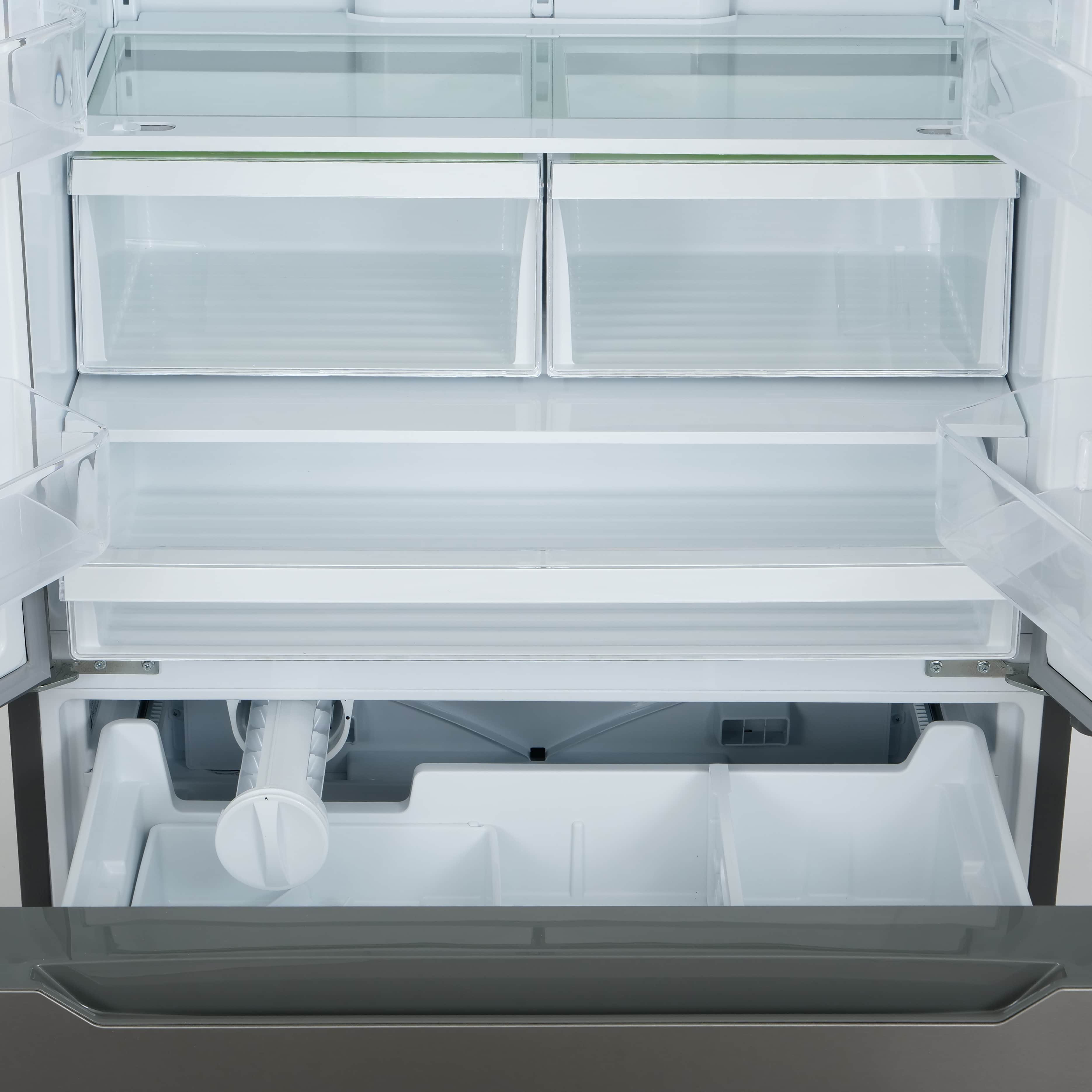 Open refrigerator with clear crisper drawers and removable shelves