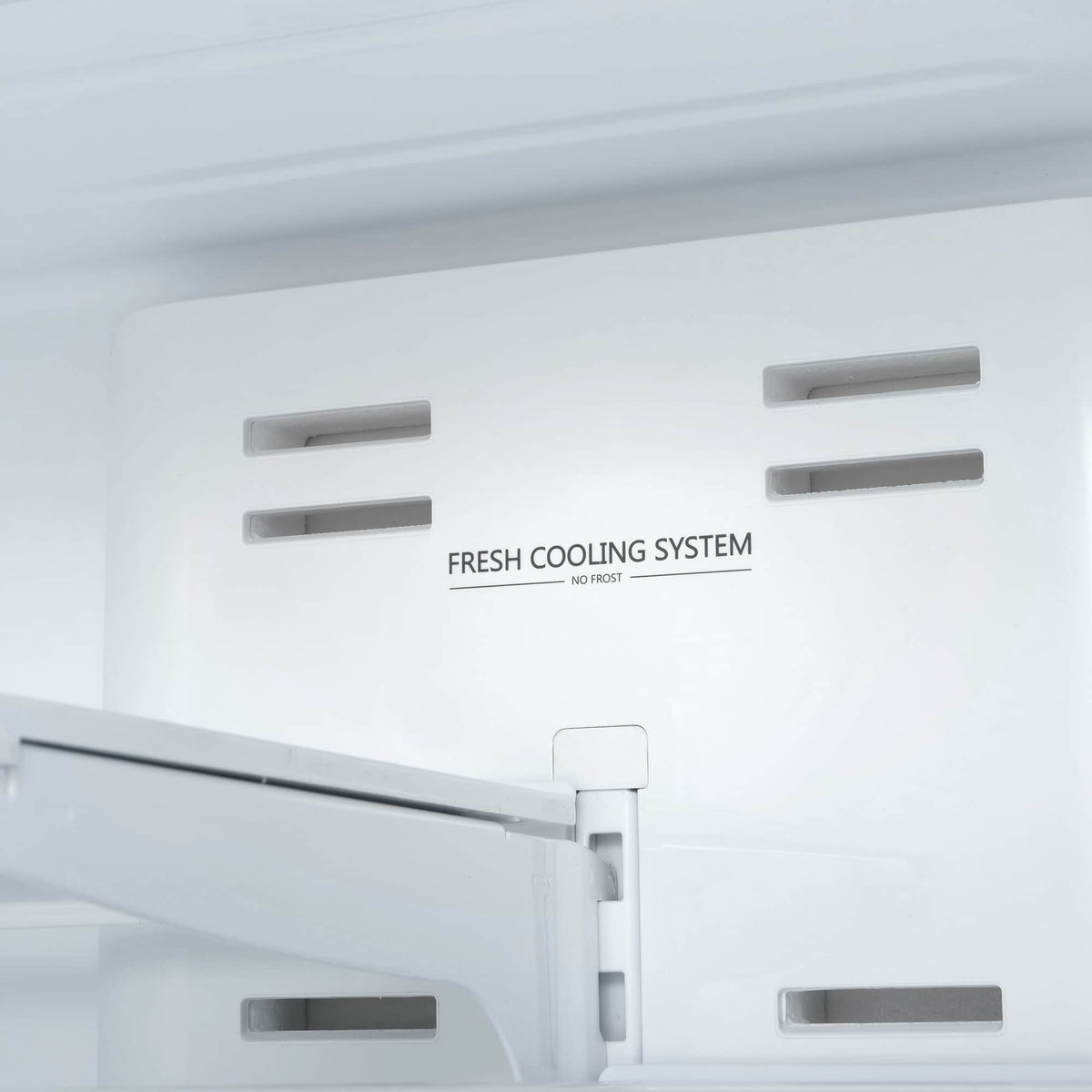Refrigerator interior feature with Fresh Cooling System label and air vents