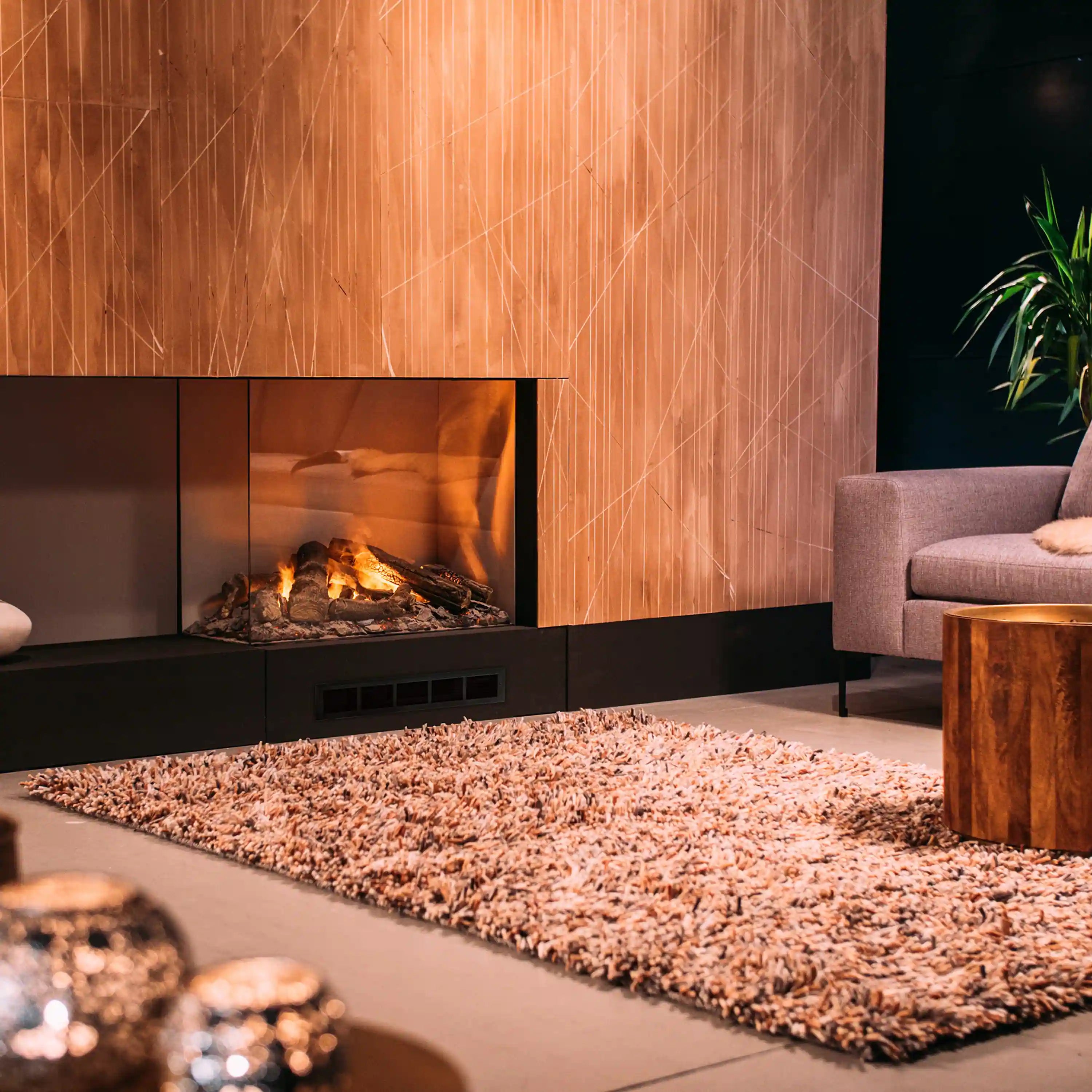 Electric firebox with burning log effect in a built-in opening, two-sided design