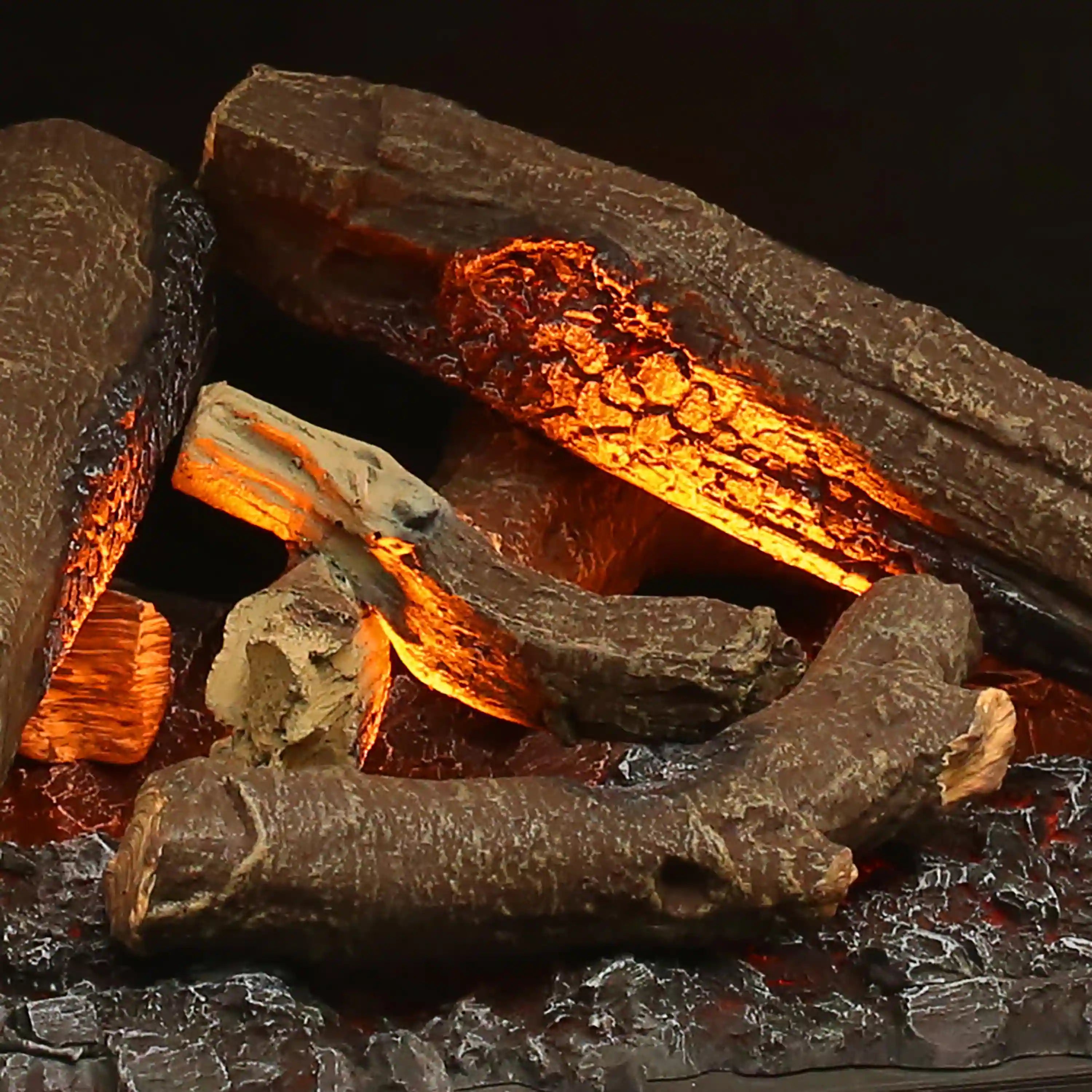 Electric firebox with glowing logs and orange flame effect in a dark fire chamber