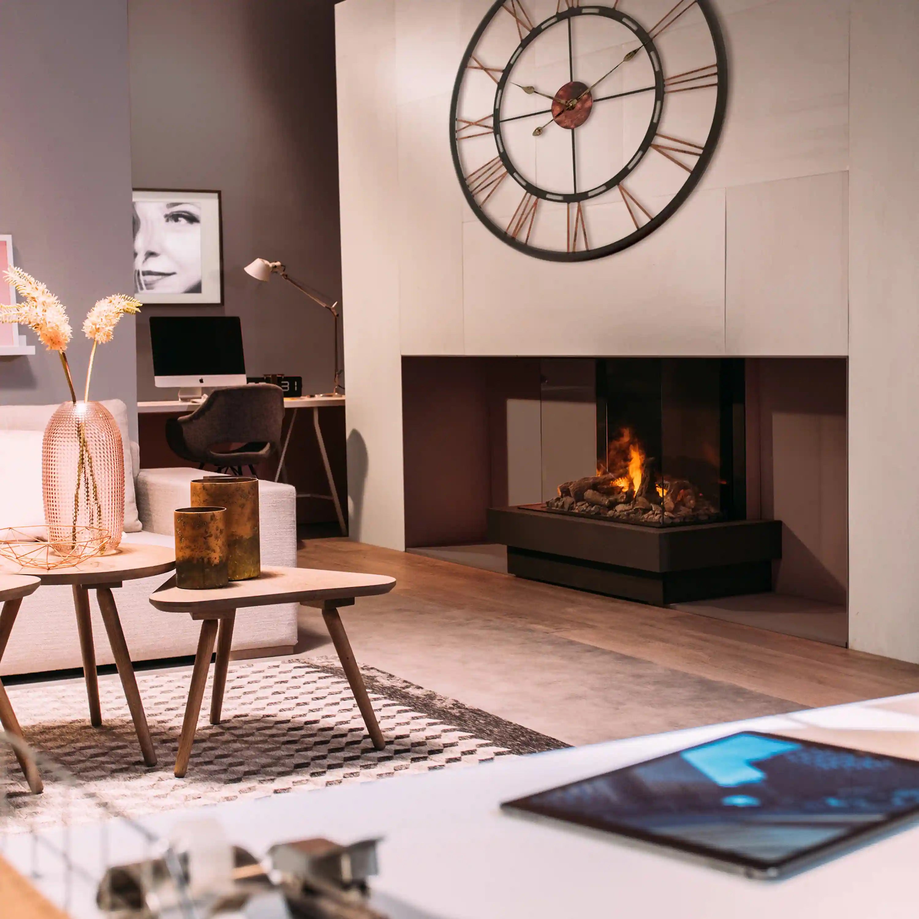 Three-sided electric firebox insert with visible flames in black surround