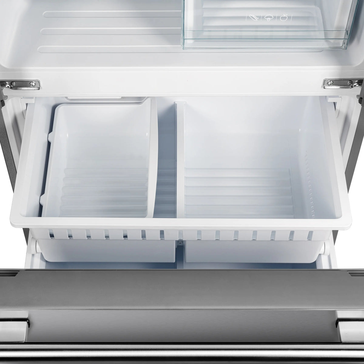 Built-in refrigerator with open freezer drawer and clear interior shelves