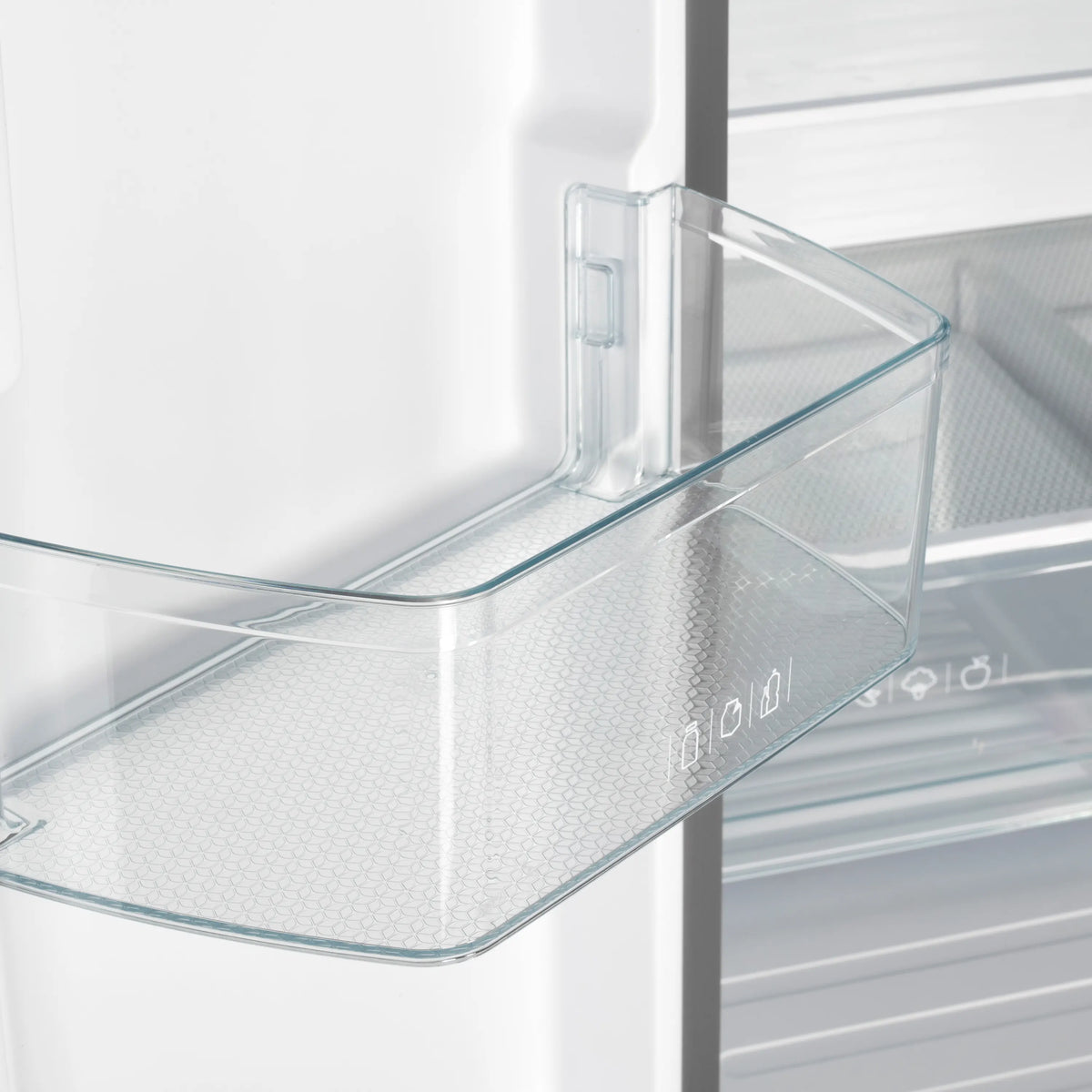 Glass shelf with raised edges inside refrigerator compartment