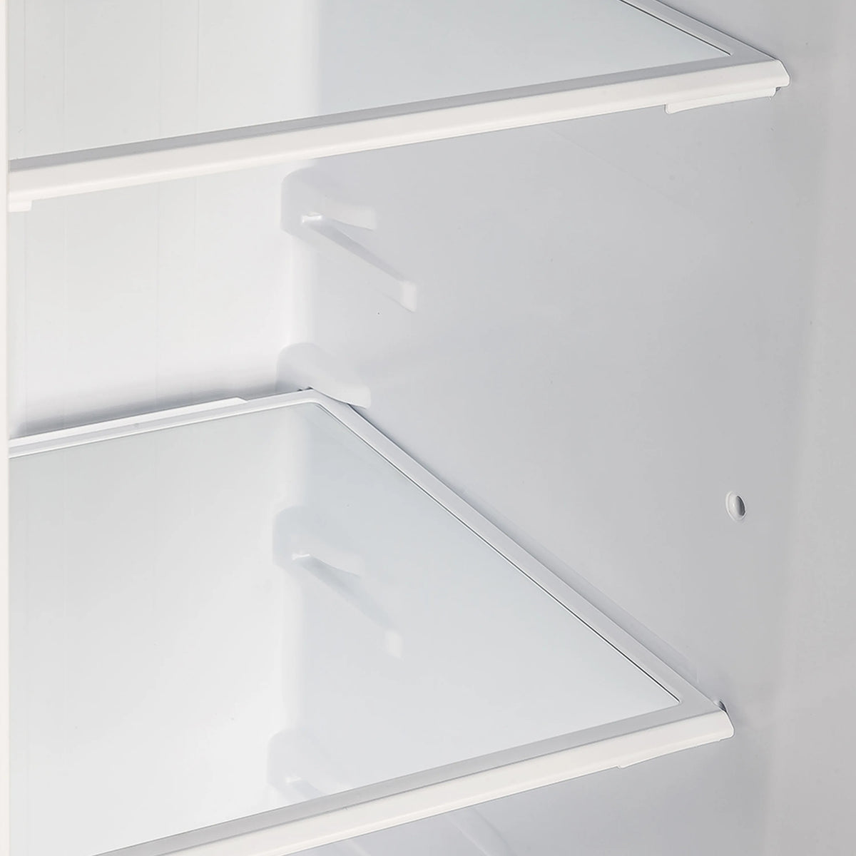 Freezer compartment view with lower shelf and interior side rails