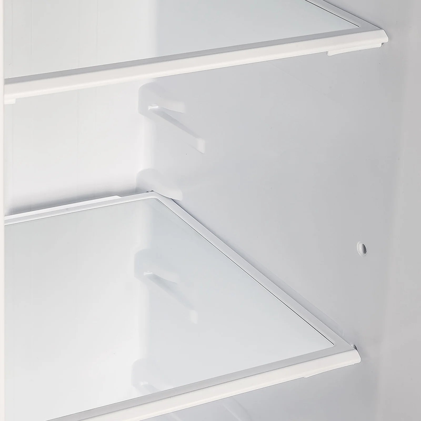 White refrigerator freezer drawer with diagonal shelf inside