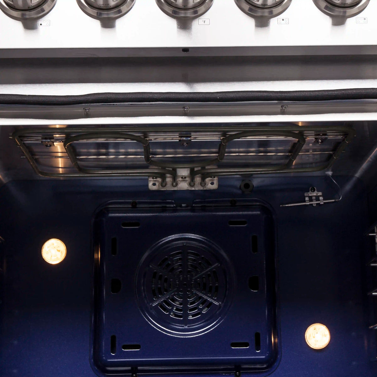 Stainless oven door open showing bake compartment with oven vents