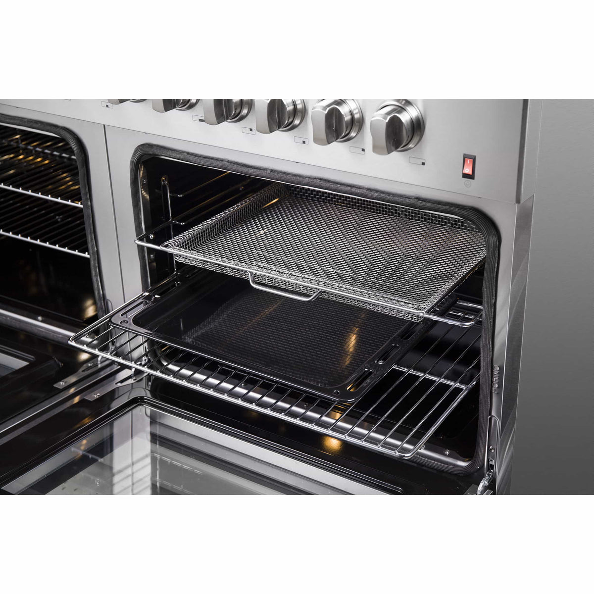 Dual fuel range oven with wire rack and mesh air-fry basket-style tray on open door