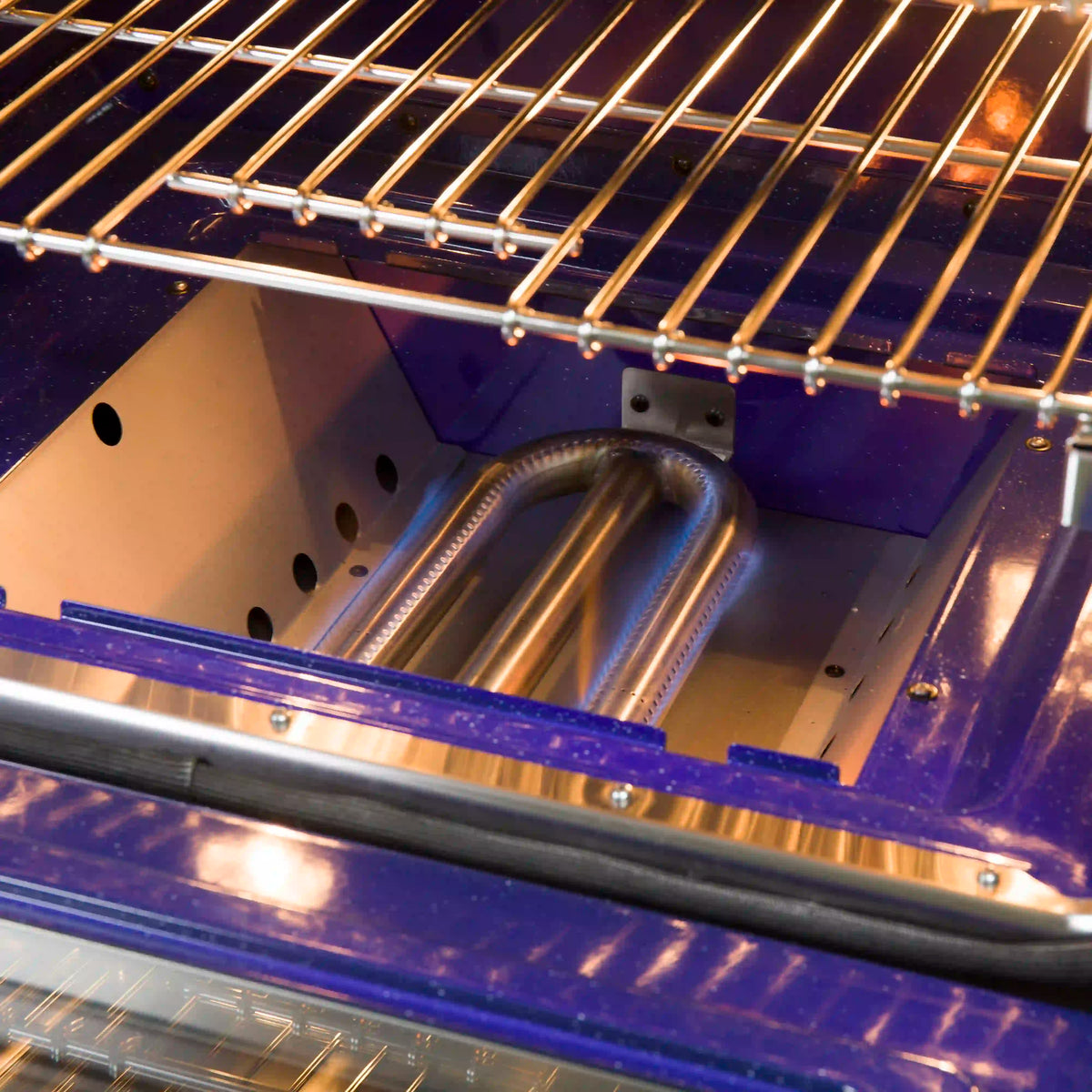 Close-up of oven interior rack and side heating elements on dual-oven gas range