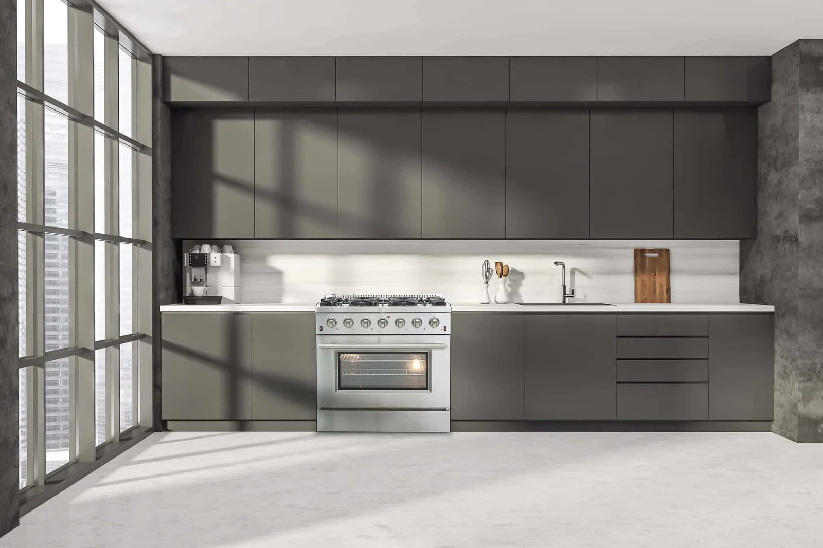 Stainless steel gas range with oven door and control knobs in a kitchen layout