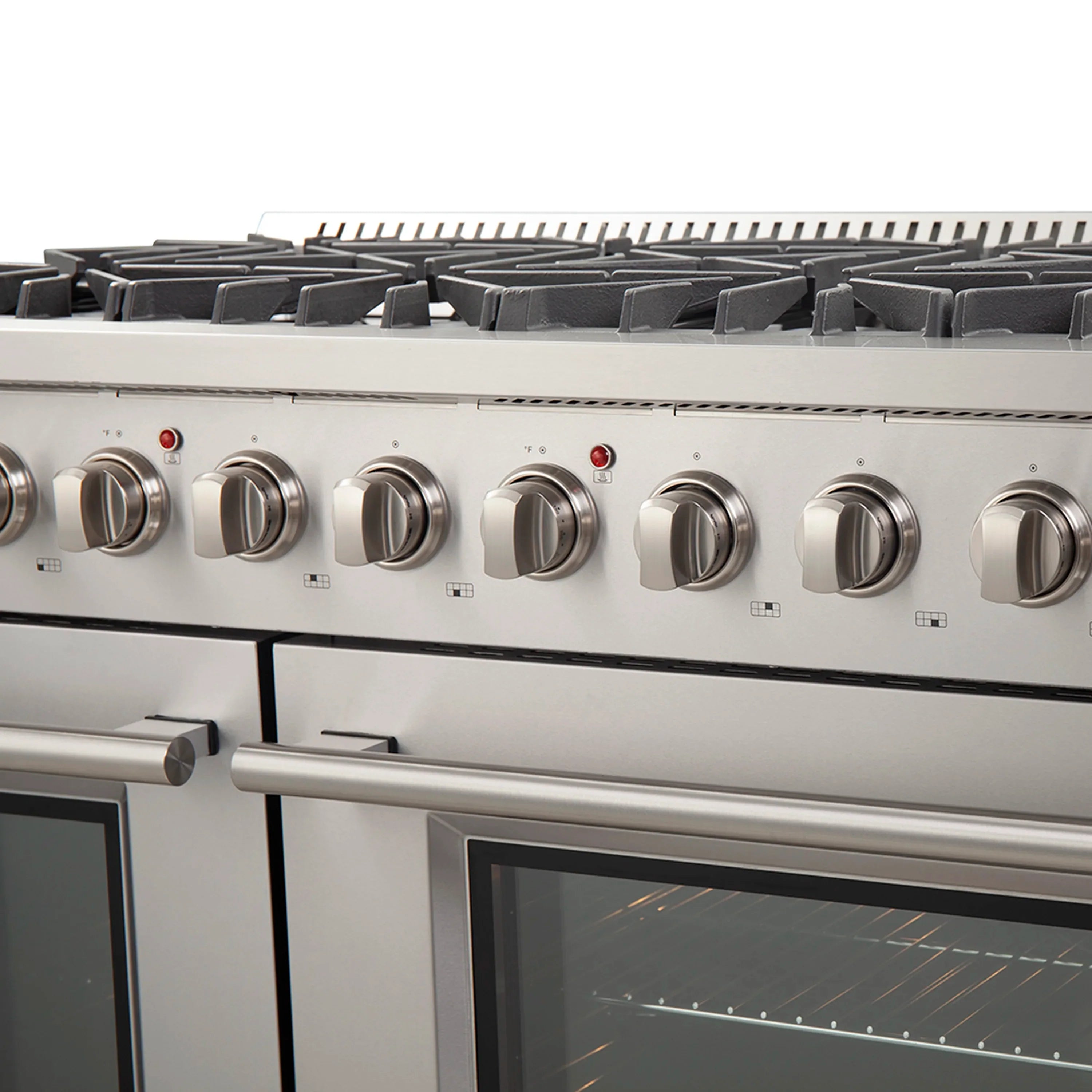 Close-up of stainless steel gas range controls and oven doors with glass panels