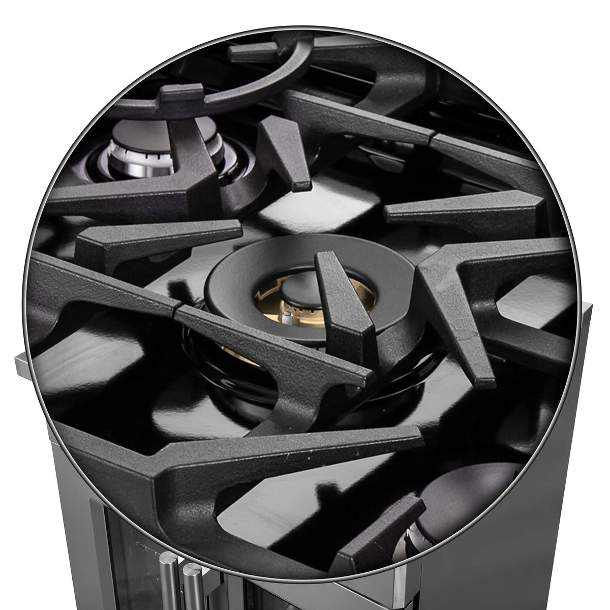 Gas burner head with black grate and brass igniter center detail
