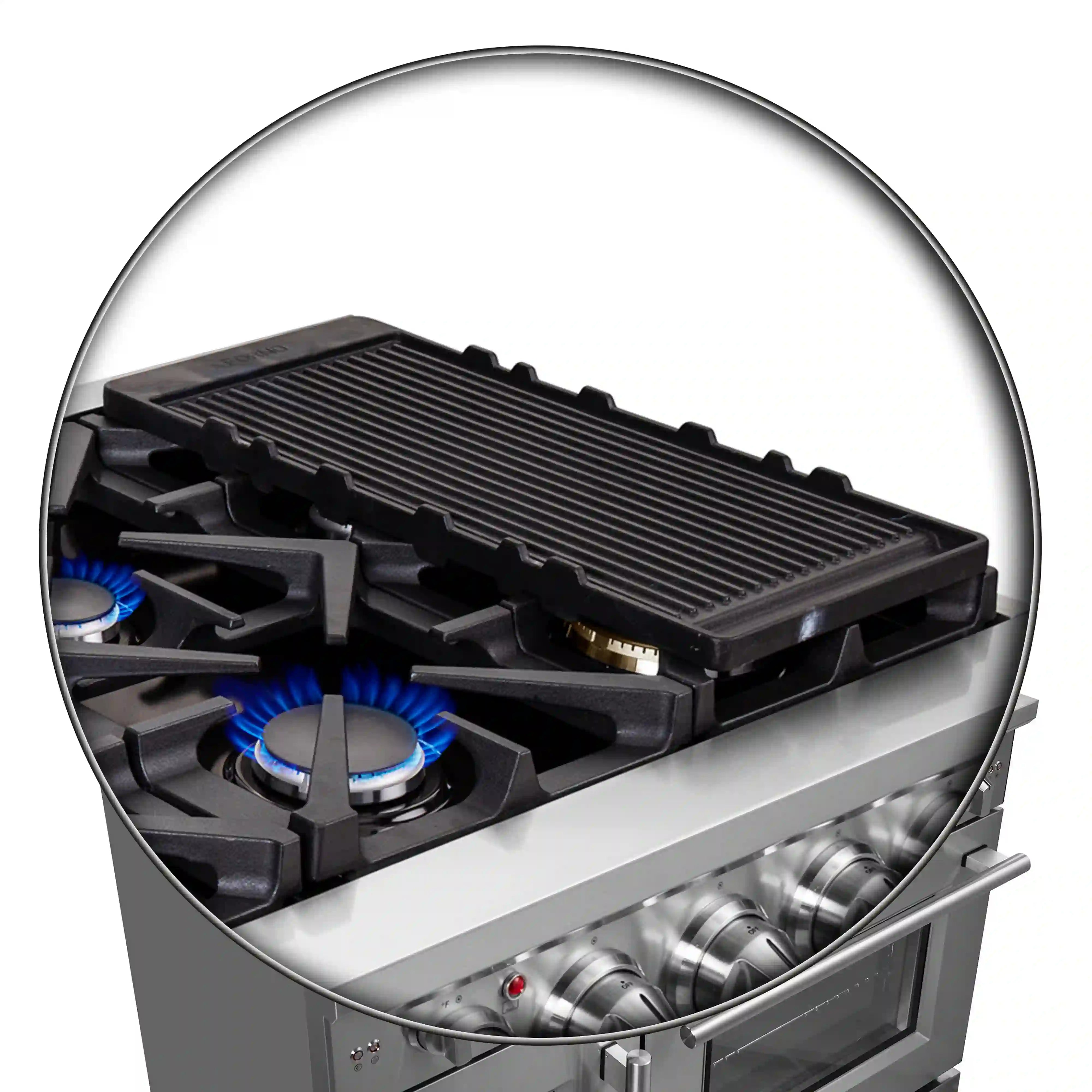 Cast-iron griddle and black burner grate on gas cooktop