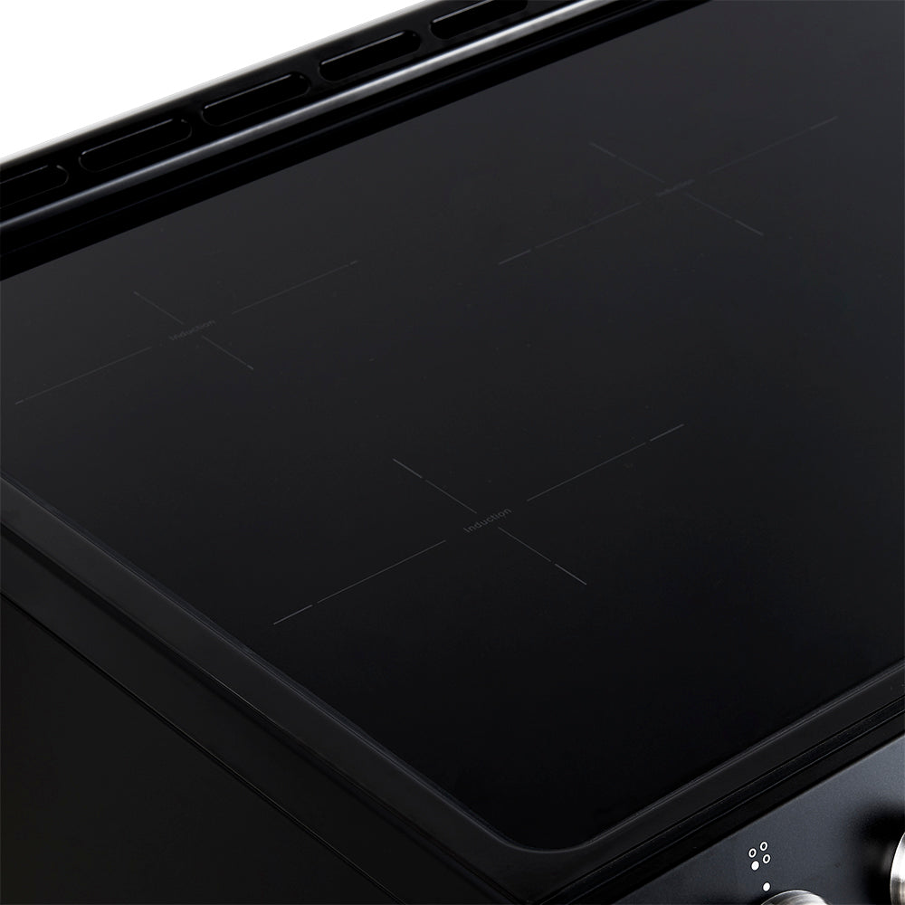 Black induction cooktop glass with touch control icons near the bottom
