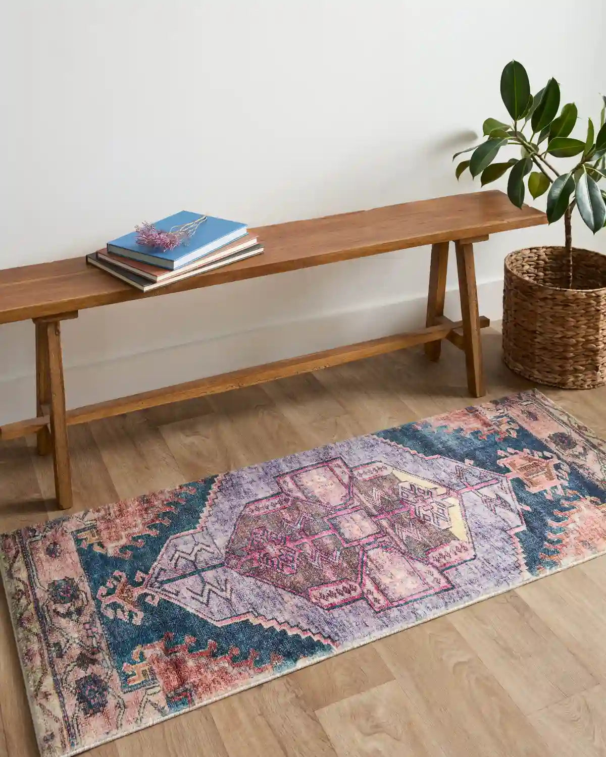 Contemporary accent rug with purple, blue, and pink geometric distressed pattern