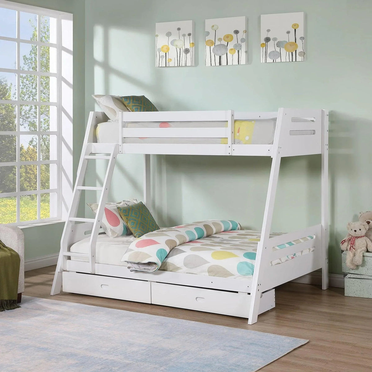 White twin bunk bed with angled ladder, guard rails, and underbed drawers; colorful bedding