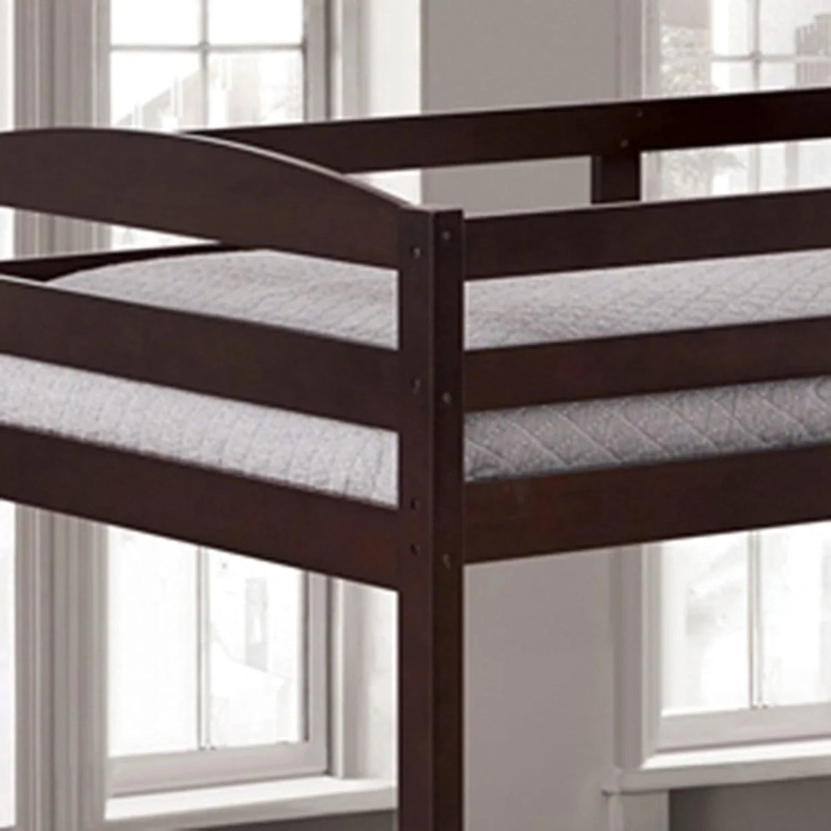 Dark brown wooden guard rail and frame slats on twin bunk bed