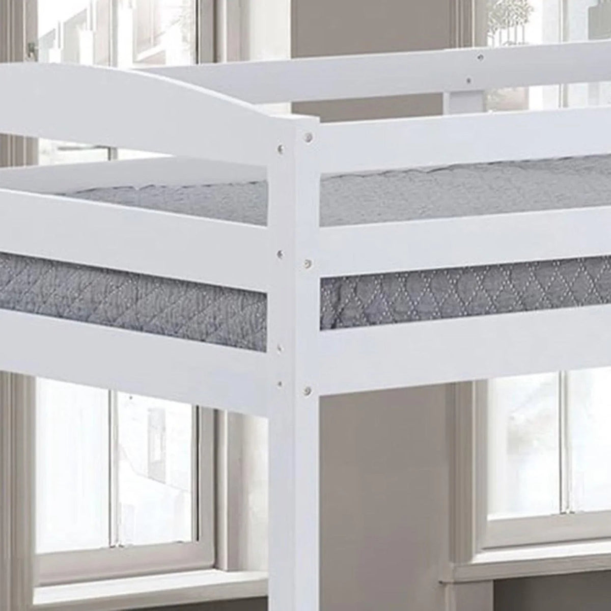 White twin-over-twin bunk bed frame with guard rails and central support slats